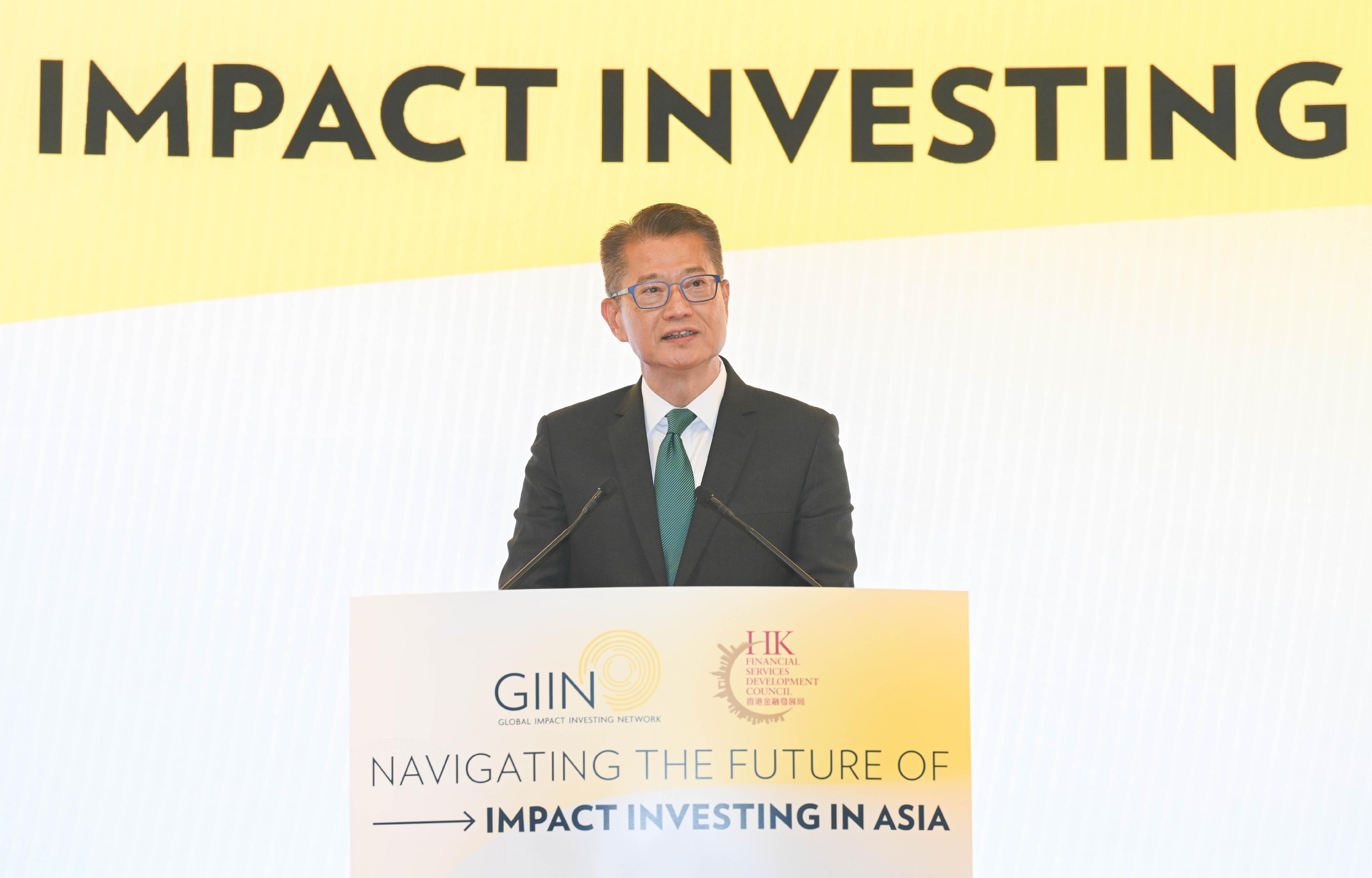 The Financial Secretary, Mr Paul Chan, speaks at the Navigating the Future of Impact Investing in Asia conference co-hosted by the Financial Services Development Council and the Global Impact Investing Network today (May 9). 