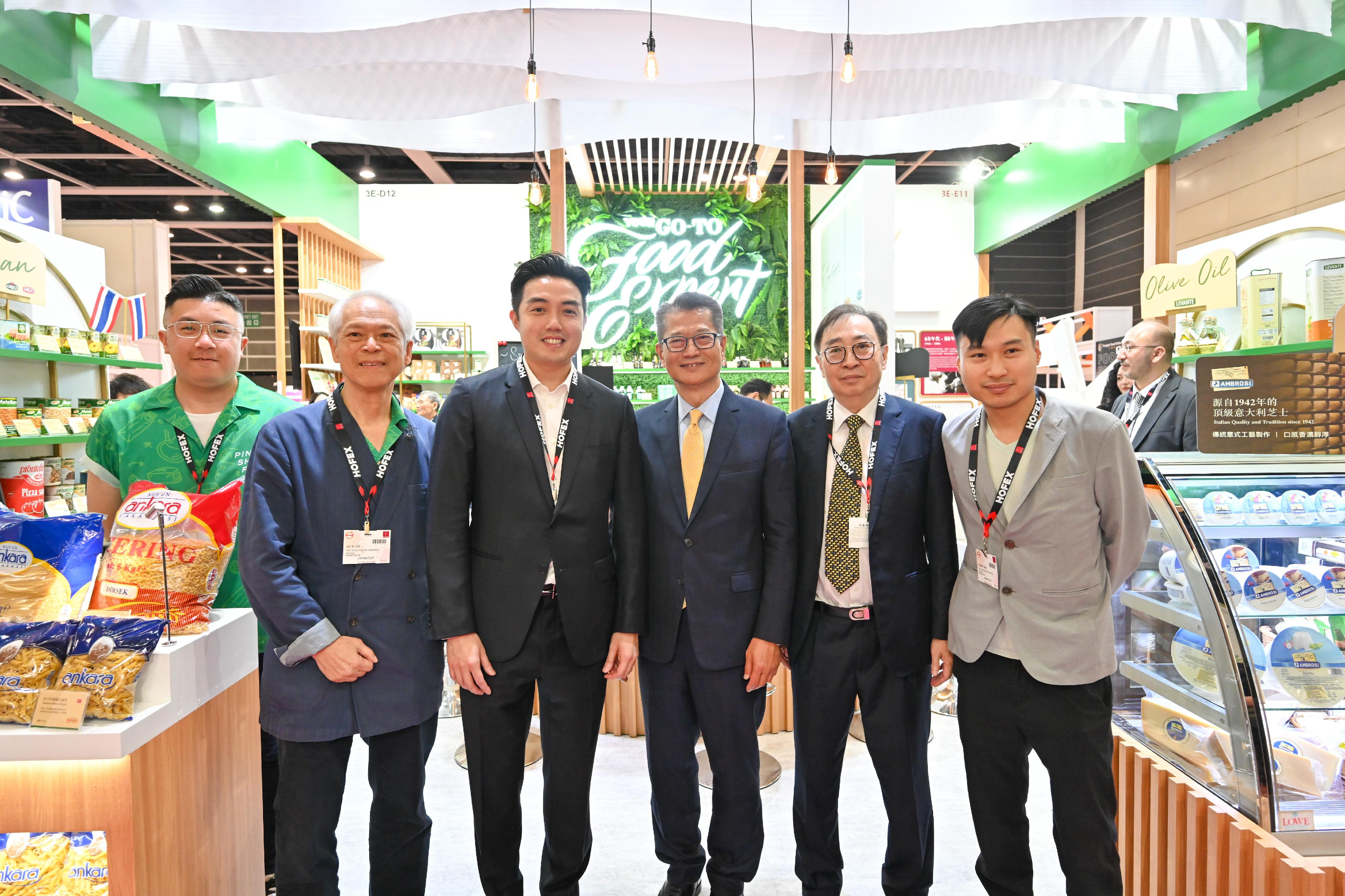 The Financial Secretary, Mr Paul Chan, attended the joint opening ceremony of HOFEX, ProWine Hong Kong @ HOFEX, the Retail Asia Conference & Expo, Build4Asia 2023 and the Hong Kong International Culinary Classic today (May 10). Photo shows Mr Chan (third right) with exhibitors.