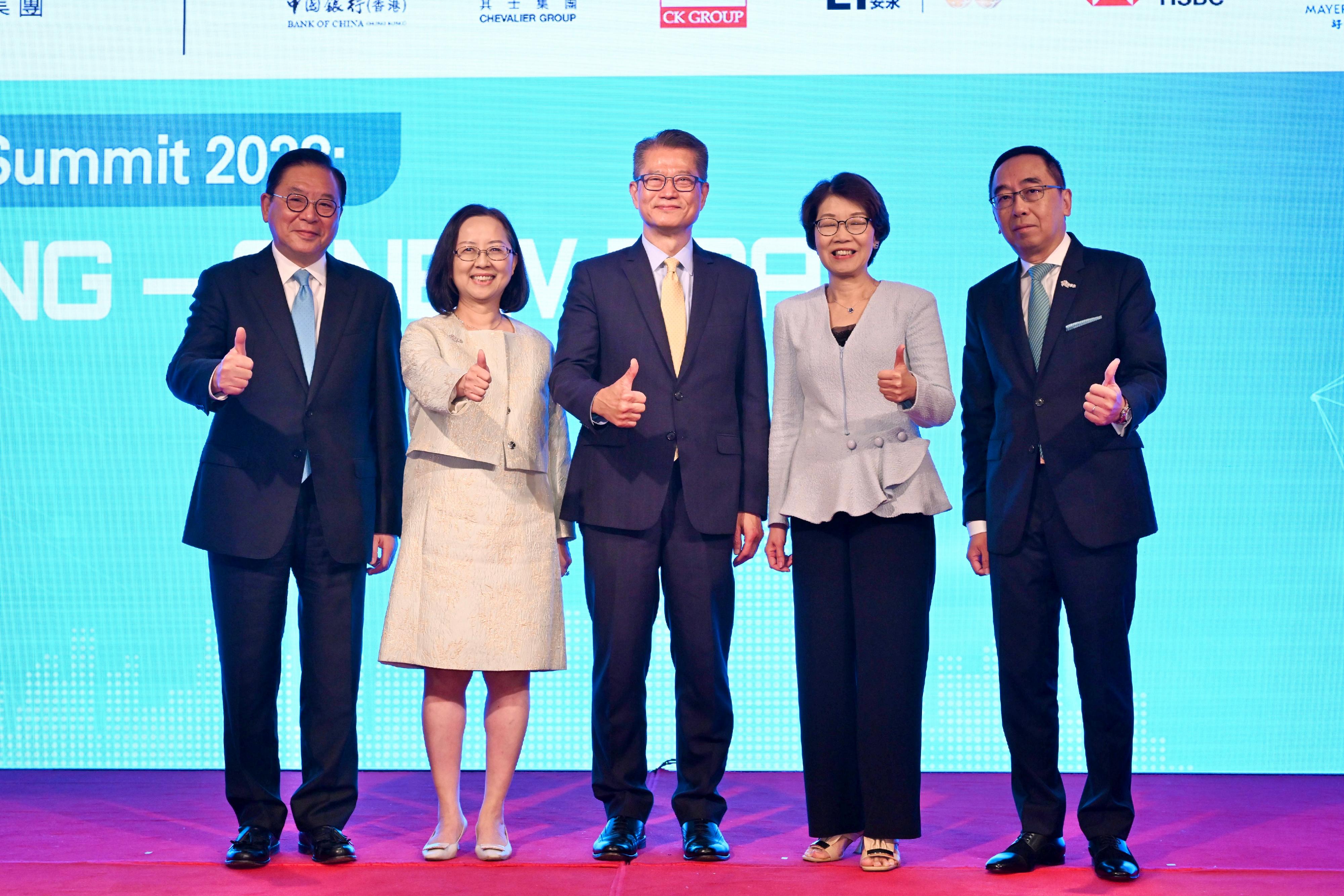 The Financial Secretary, Mr Paul Chan, attended the Hong Kong Business Summit 2023 organised by the Hong Kong General Chamber of Commerce (HKGCC) today (May 10). Photo shows (from left) Non-official Member of the Executive Council, Legislative Council Member Mr Jeffrey Lam; the Deputy Chairman of the HKGCC, Ms Agnes Chan; Mr Chan; the Chairman of the HKGCC, Mrs Betty Yuen, and the Chief Executive Officer of the HKGCC, Mr George Leung, at the summit. 