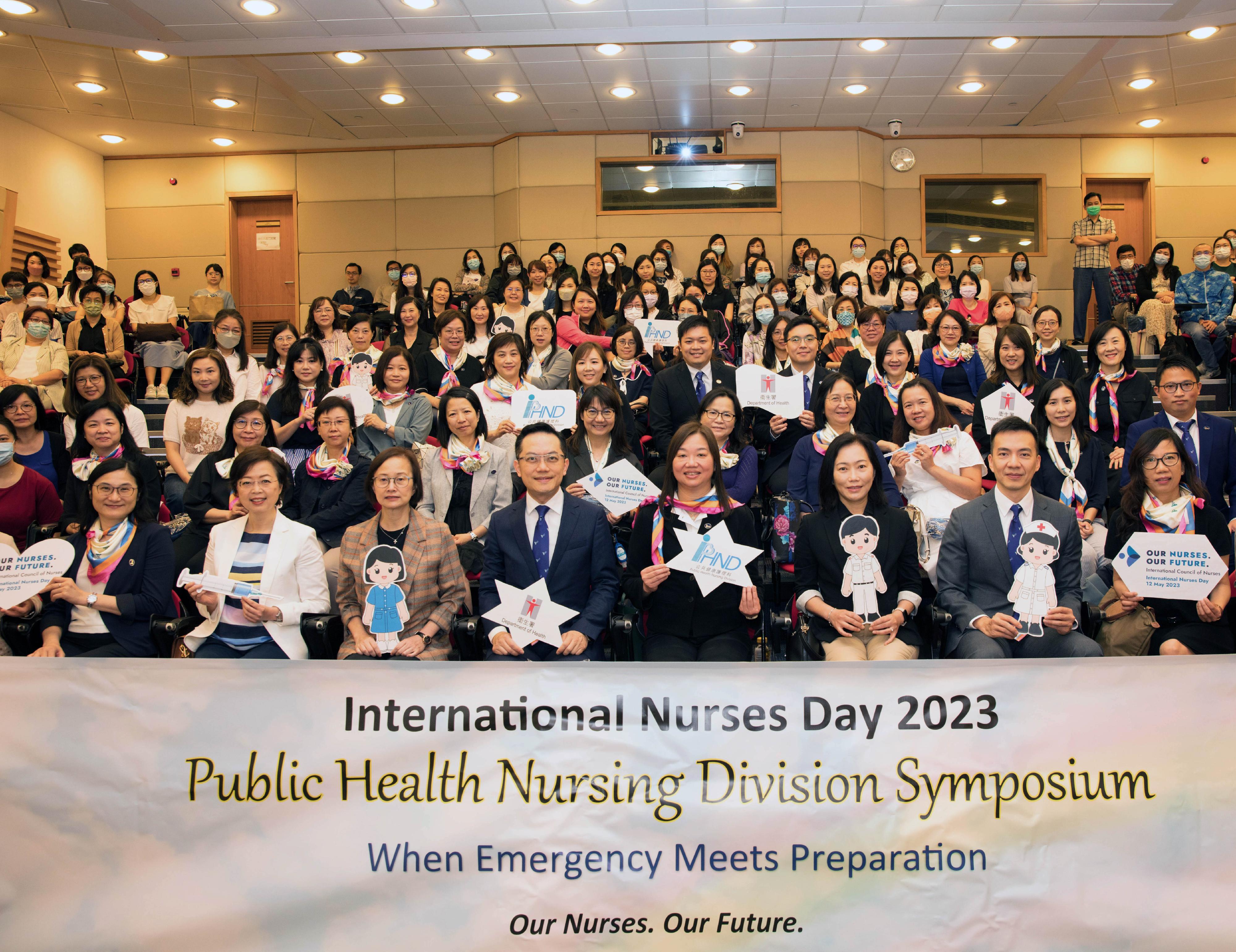 To echo the International Nurses Day 2023, which is being celebrated today (May 12), the Department of Health (DH) has organised various activities, including a thematic symposium held on May 6. The management of the DH, including the Director of Health, Dr Ronald Lam (front row, fourth left); the Controller of Regulatory Affairs of the DH, Dr Amy Chiu (front row, third left); the Deputy Director of Health, Dr Teresa Li (front row, third right); the Assistant Director (Health Administration and Planning), Dr Jackie Leung (front row, second left); the Assistant Director (Chinese Medicine), Dr Edmund Fong (front row, second right); and the Principal Nursing Officer, Ms Lucia Ko (front row, fourth right), and public health nurses of the DH are pictured at the symposium.
