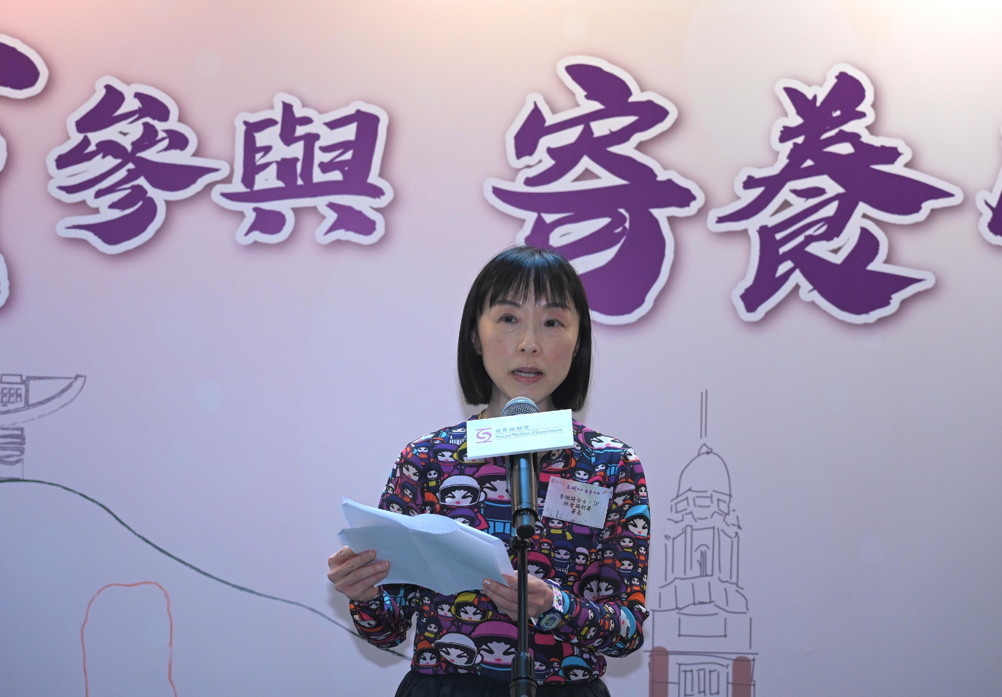 The Social Welfare Department today (May 14) organised the Let's Join Foster Care Service event which aimed to enhance public understanding on foster care service with game booths and a thematic exhibition. Photo shows the Director of Social Welfare, Miss Charmaine Lee, addressing the event.