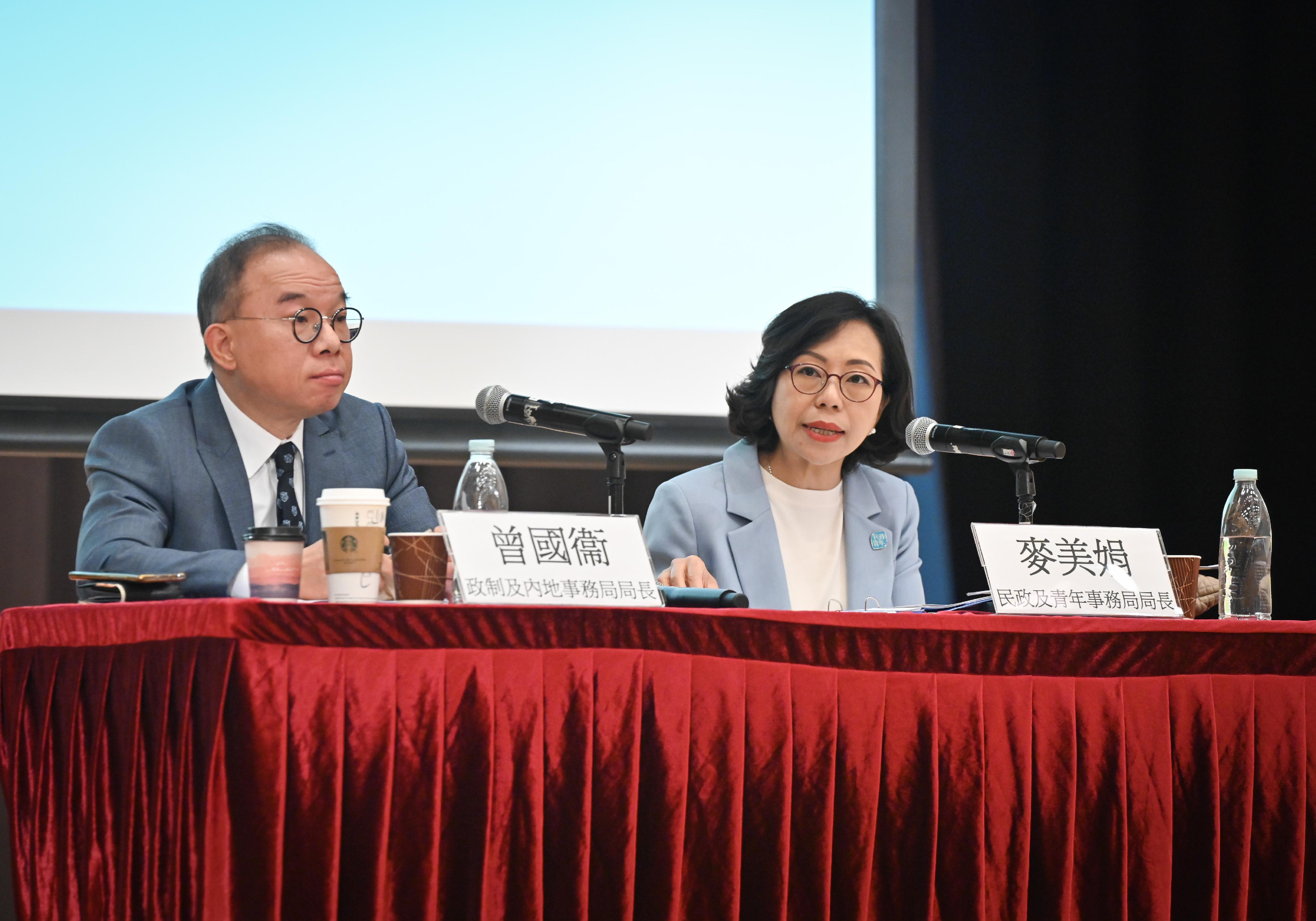 The Secretary for Constitutional and Mainland Affairs, Mr Erick Tsang Kwok-wai, and the Secretary for Home and Youth Affairs, Miss Alice Mak, today (May 15) briefed district representatives on the proposals to improve governance at the district level. Photo shows Mr Tsang (left) and Miss Mak briefing district representatives on the proposals.