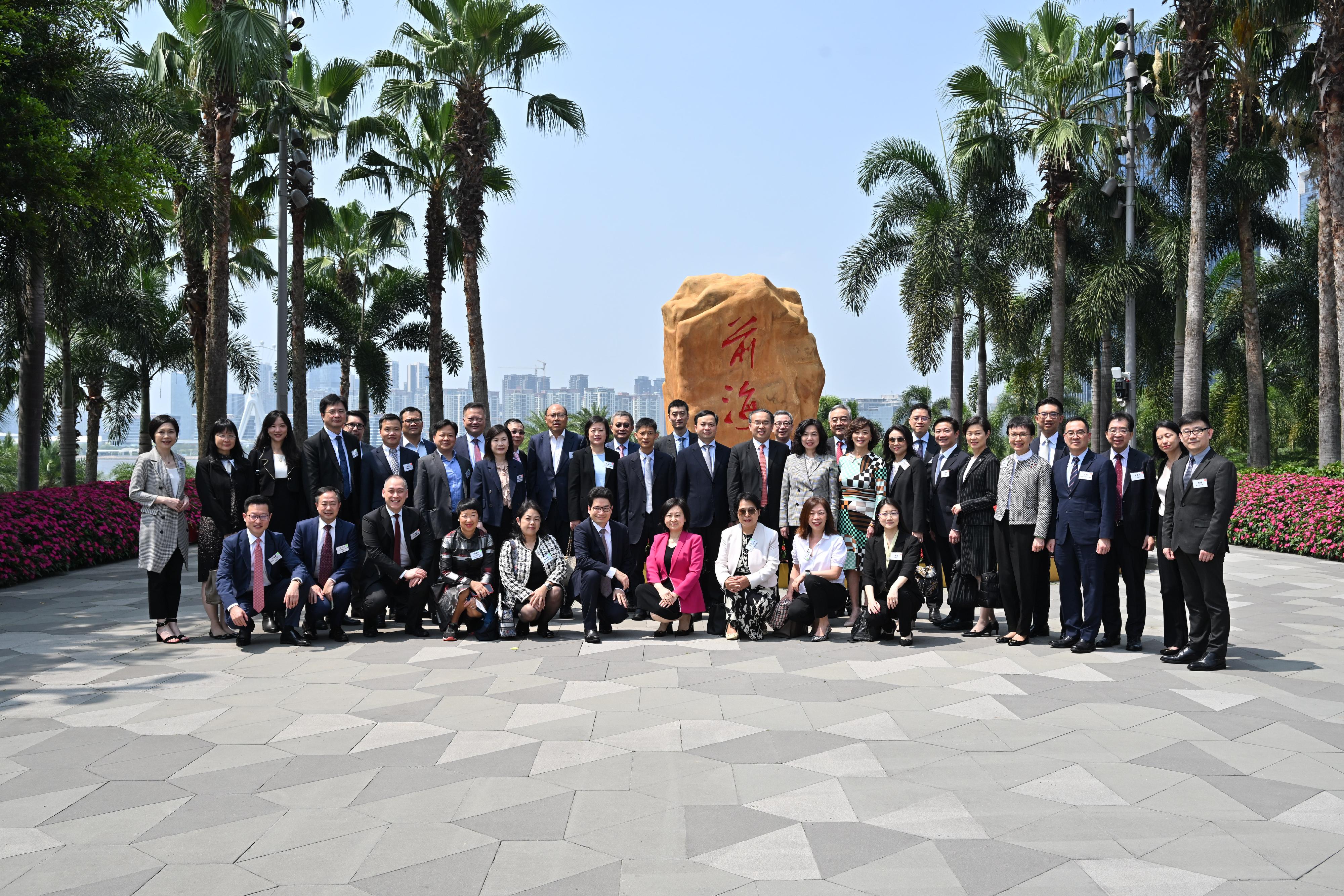 The Secretary for Financial Services and the Treasury, Mr Christopher Hui, led a Hong Kong financial sector delegation to attend a Shenzhen-Hong Kong liaison event on promoting 30 Financial Support Measures for Qianhai held in Shenzhen today (May 18). Photo shows Mr Hui (back row, 15th right); the Permanent Secretary for Financial Services and the Treasury (Financial Services), Ms Salina Yan (back row, 13th right); and the Under Secretary for Financial Services and the Treasury, Mr Joseph Chan (front row, fifth right), with the delegation in the Qianhai Stone Park. On the left of Mr Hui is the First Deputy Director General of the Authority of Qianhai Shenzhen-Hong Kong Modern Service Industry Cooperation Zone of Shenzhen Municipality, Mr Huang Xiaopeng.