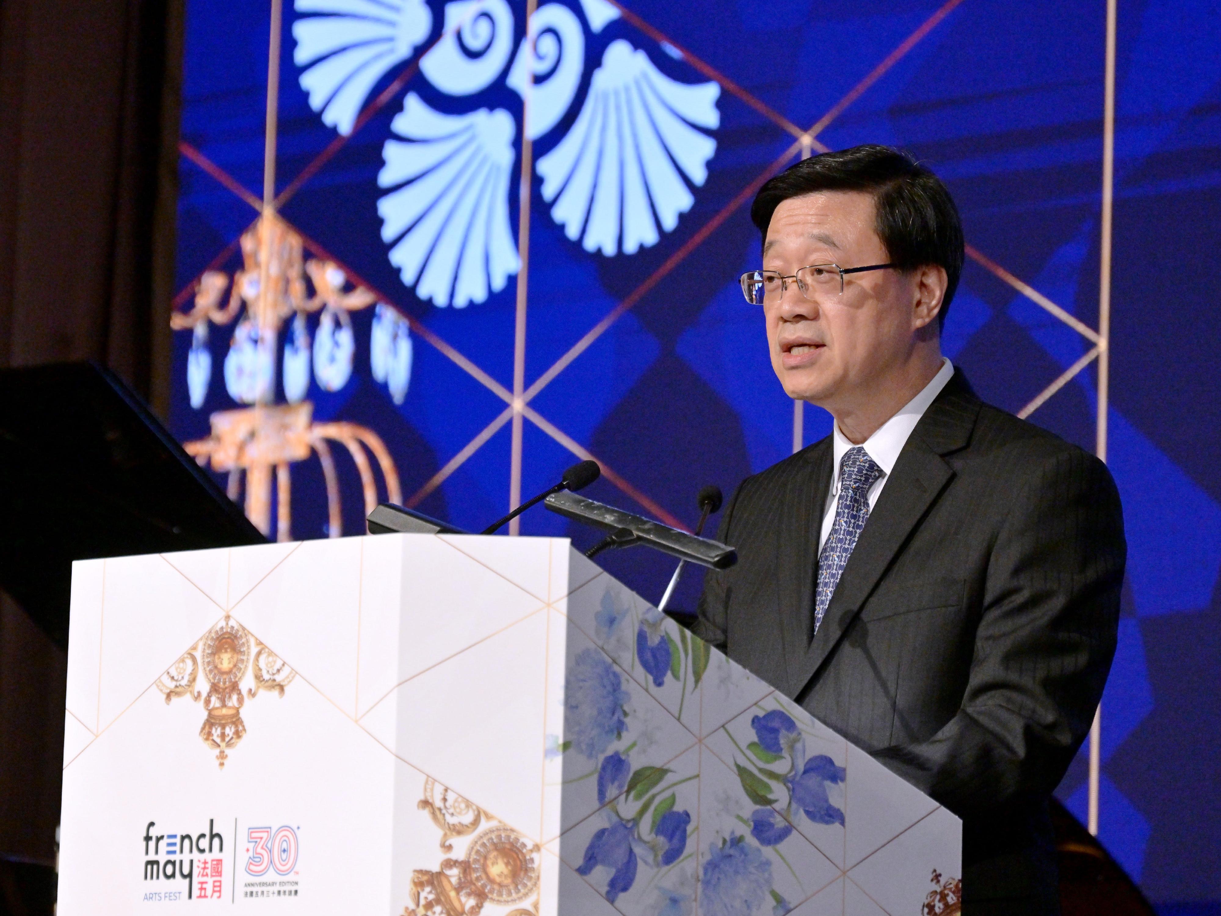 The Chief Executive, Mr John Lee, speaks at the 30th Anniversary Celebration of French May Arts Festival Gala Dinner today (May 18).