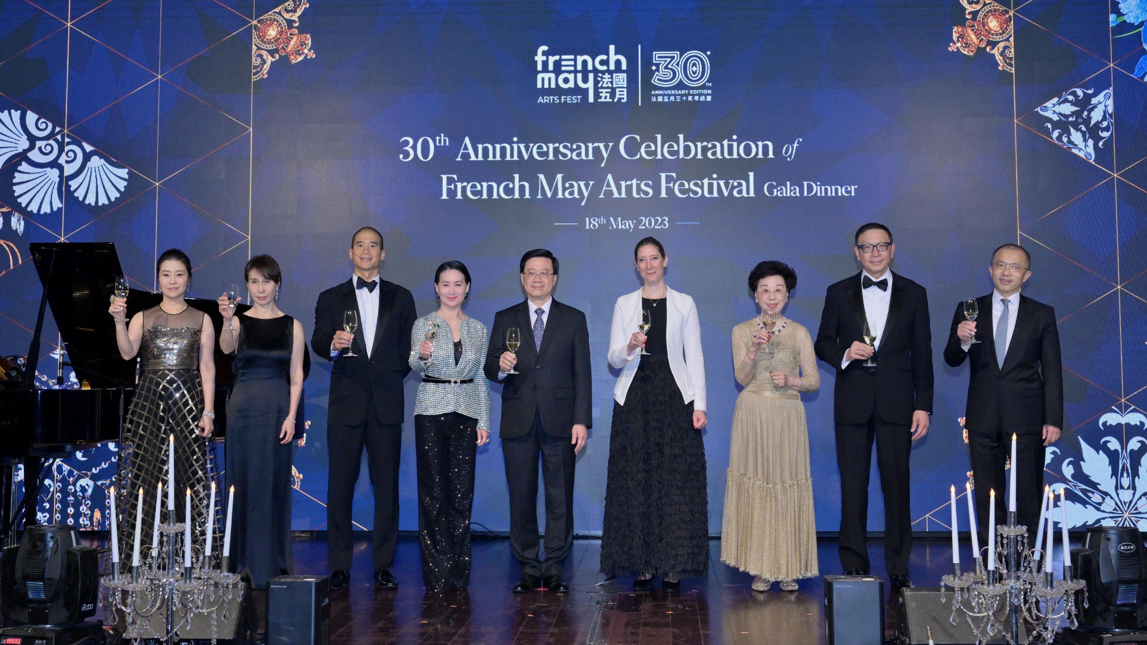 The Chief Executive, Mr John Lee, attended the 30th Anniversary Celebration of French May Arts Festival Gala Dinner today (May 18). Photo shows (from fourth left) Co-chairman of the Board of French May Arts Festival Ms Pansy Ho; Mr Lee; the Consul General of France in Hong Kong and Macau, Mrs Christile Drulhe; Co-chairman of the Board of French May Arts Festival Mrs Mignonne Cheng, and other guests.