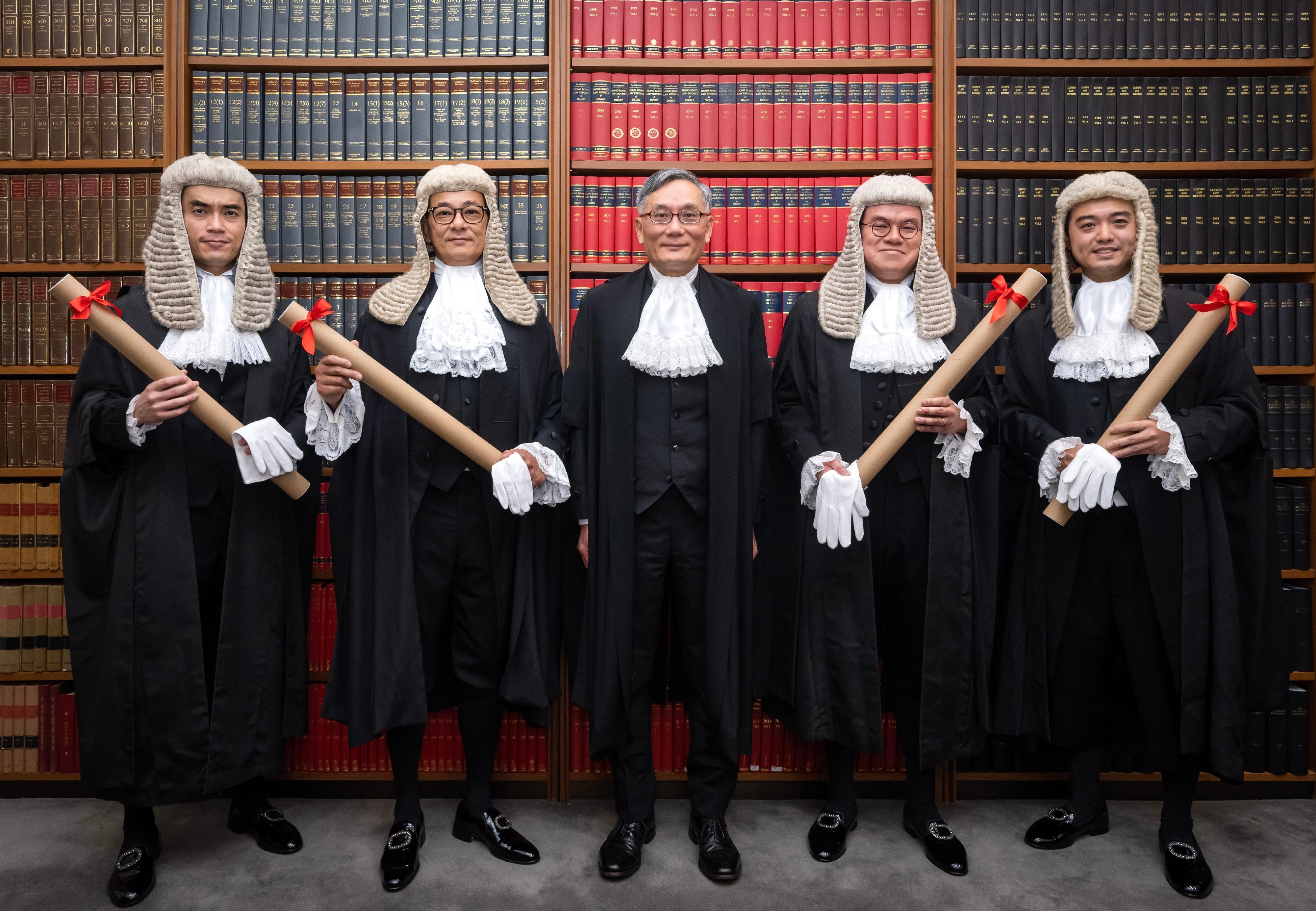The ceremonial proceedings for the admission of the newly appointed Senior Counsel took place at the Court of Final Appeal today (May 20). Photo shows the Chief Justice of the Court of Final Appeal, Mr Andrew Cheung Kui-nung (centre), with the newly appointed Senior Counsel Mr Bruce Tse Chee-ho (second left), Mr Anthony Chan Ho-ki (second right), Mr Mike Lui Sai-kit (first left), and Mr Christopher Chain Siao-liang (first right).