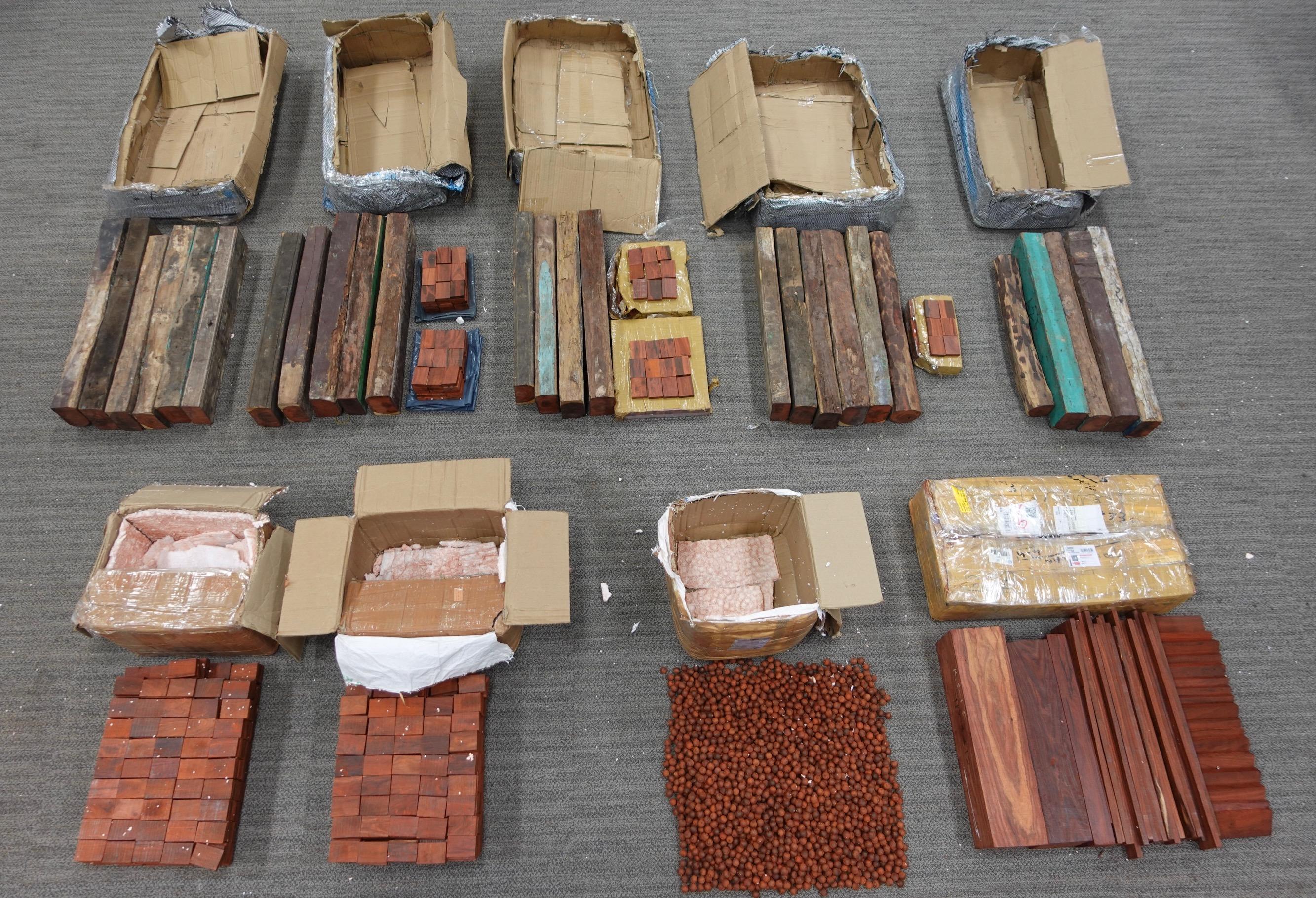 Hong Kong Customs on May 16 and yesterday (May 22) seized a total of about 192 kilograms of suspected scheduled red sandalwood, with an estimated market value of about $1 million, at Hong Kong International Airport and in Sheung Shui. Photo shows the suspected scheduled red sandalwood seized.