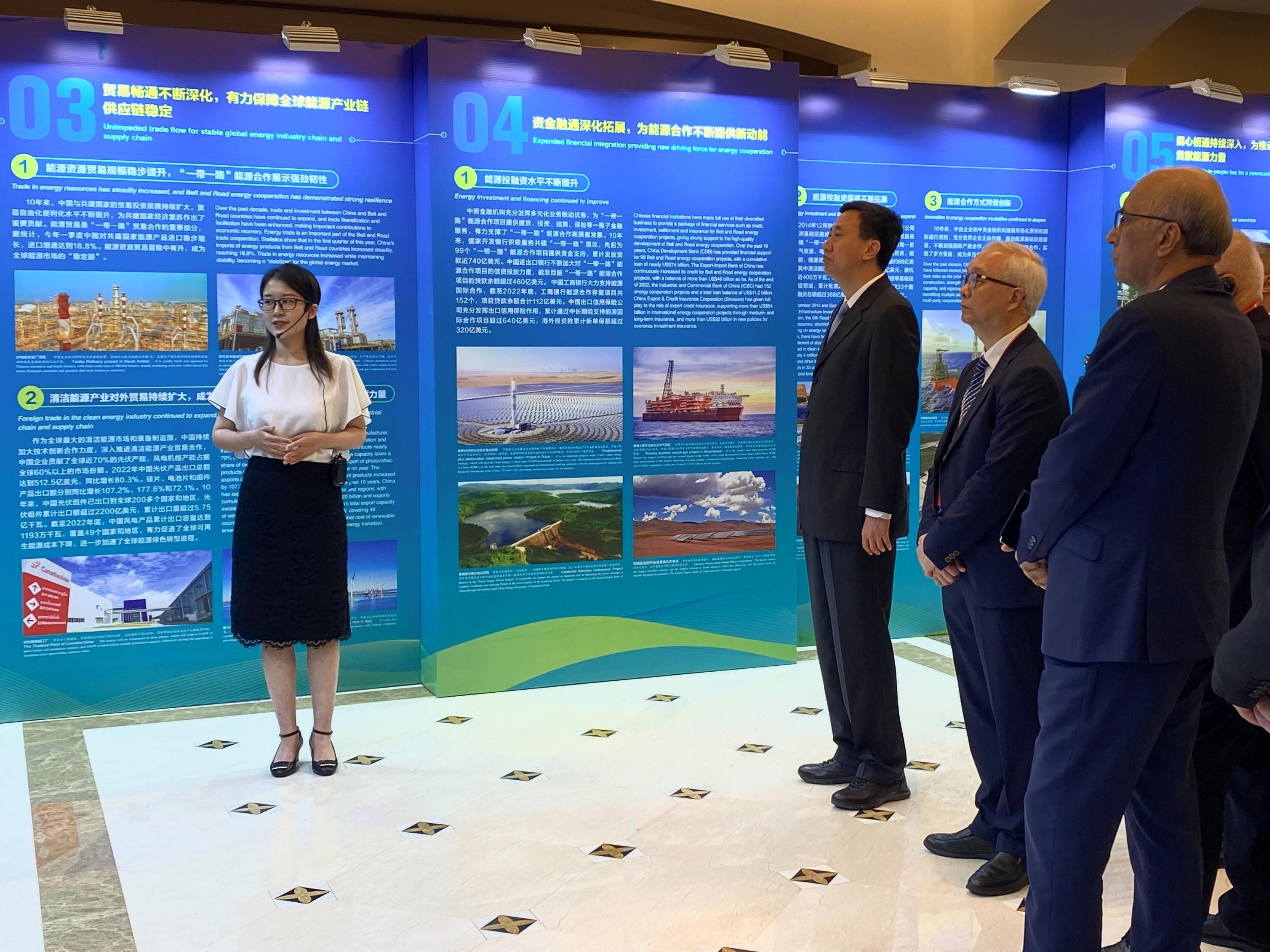 The Secretary for Environment and Ecology, Mr Tse Chin-wan, today (May 24) attended the Third Belt and Road Energy Partnership Forum in Xiamen. Photo shows Mr Tse (second right) and Deputy Director of the National Energy Administration Mr Ren Jingdong (third right), visiting the Exhibition on the 10th Anniversary of Belt and Road Energy Cooperation, specially set-up for the event, with representatives from other  countries. 