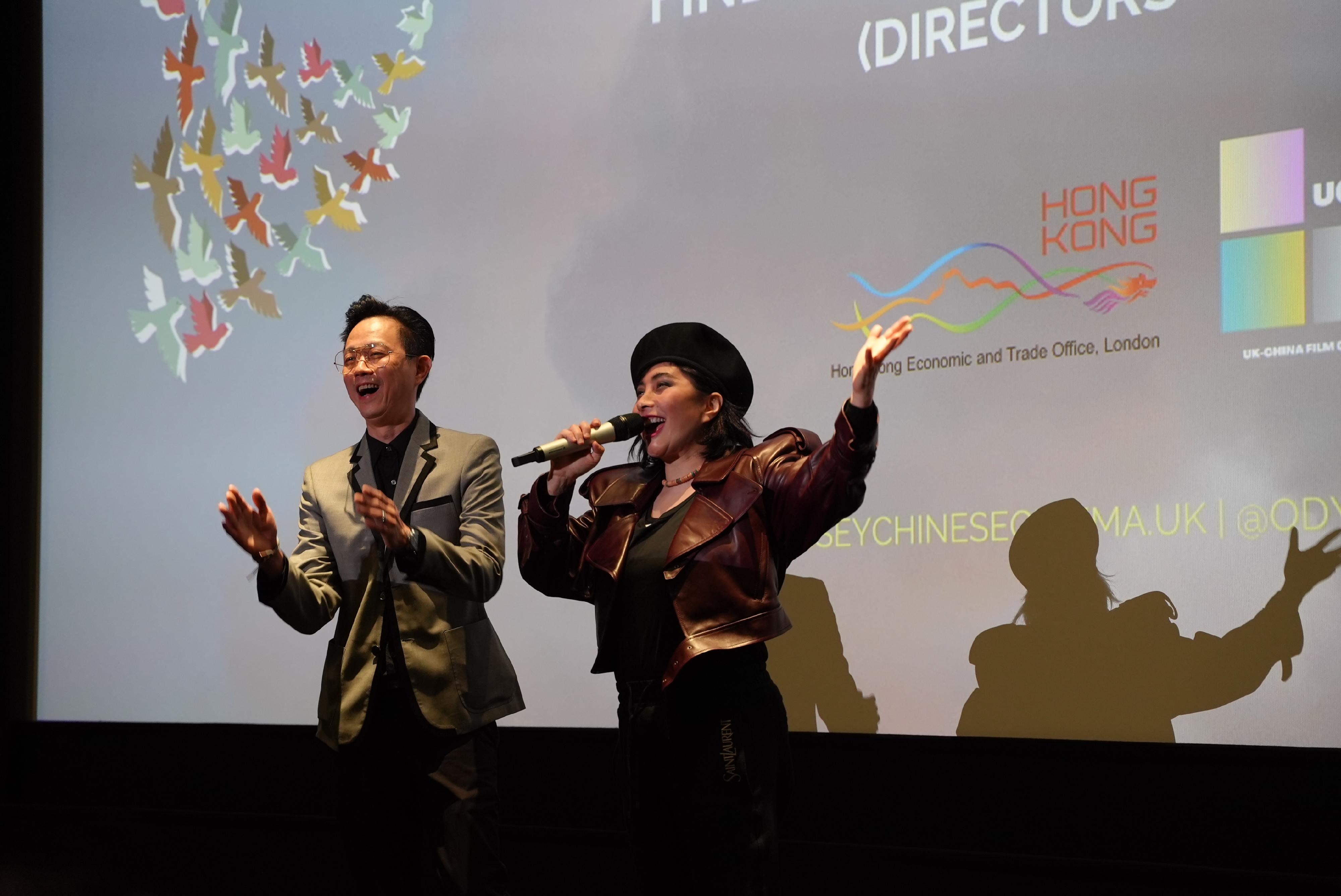 The Hong Kong Economic and Trade Office, London and Create Hong Kong supported the opening screening and reception of Odyssey 2023 film festival held at the Battersea Power Station, London on May 26 (London time).   Photo shows the leading actress and Director of "Finding Bliss: Fire and Ice - The Director's Cut" Josie Ho and Kim Chan welcoming audience of the opening screening. 