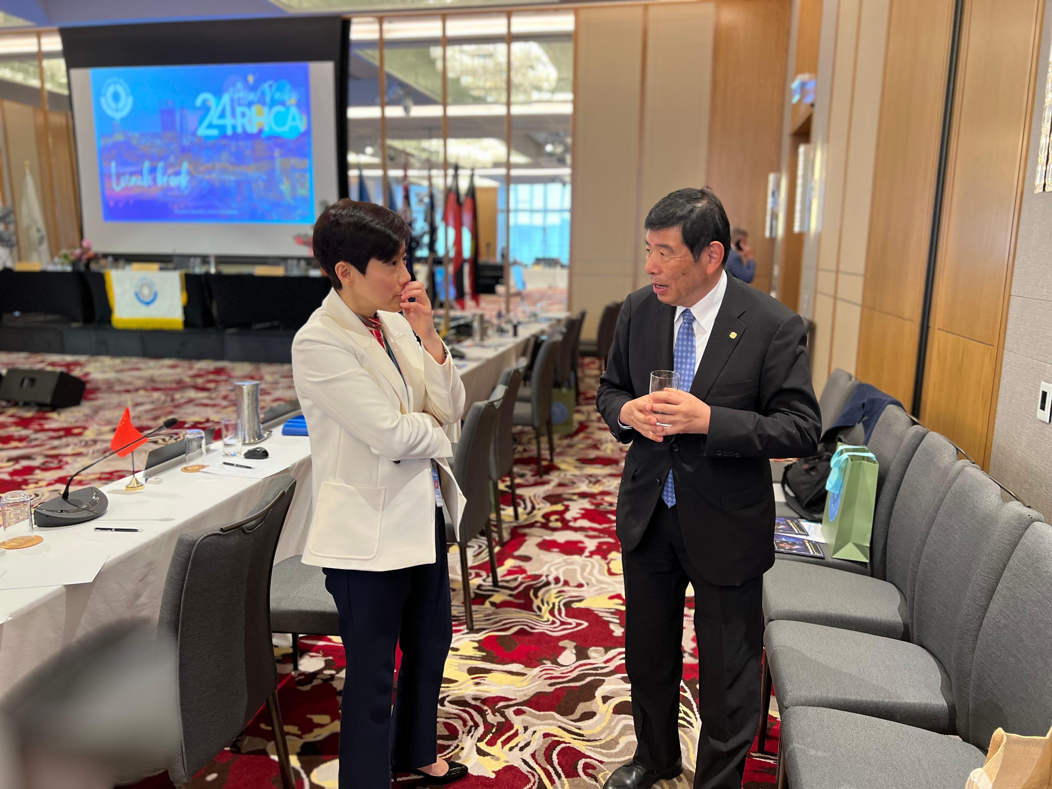The Commissioner of Customs and Excise, Ms Louise Ho (left), from May 28 to 31, led a delegation to attend the 24th World Customs Organization (WCO) Asia/Pacific Regional Heads of Customs Administrations Conference in Perth, Australia. Photo shows Ms Ho exchanging views with the WCO Secretary-General, Dr Kunio Mikuriya (right).