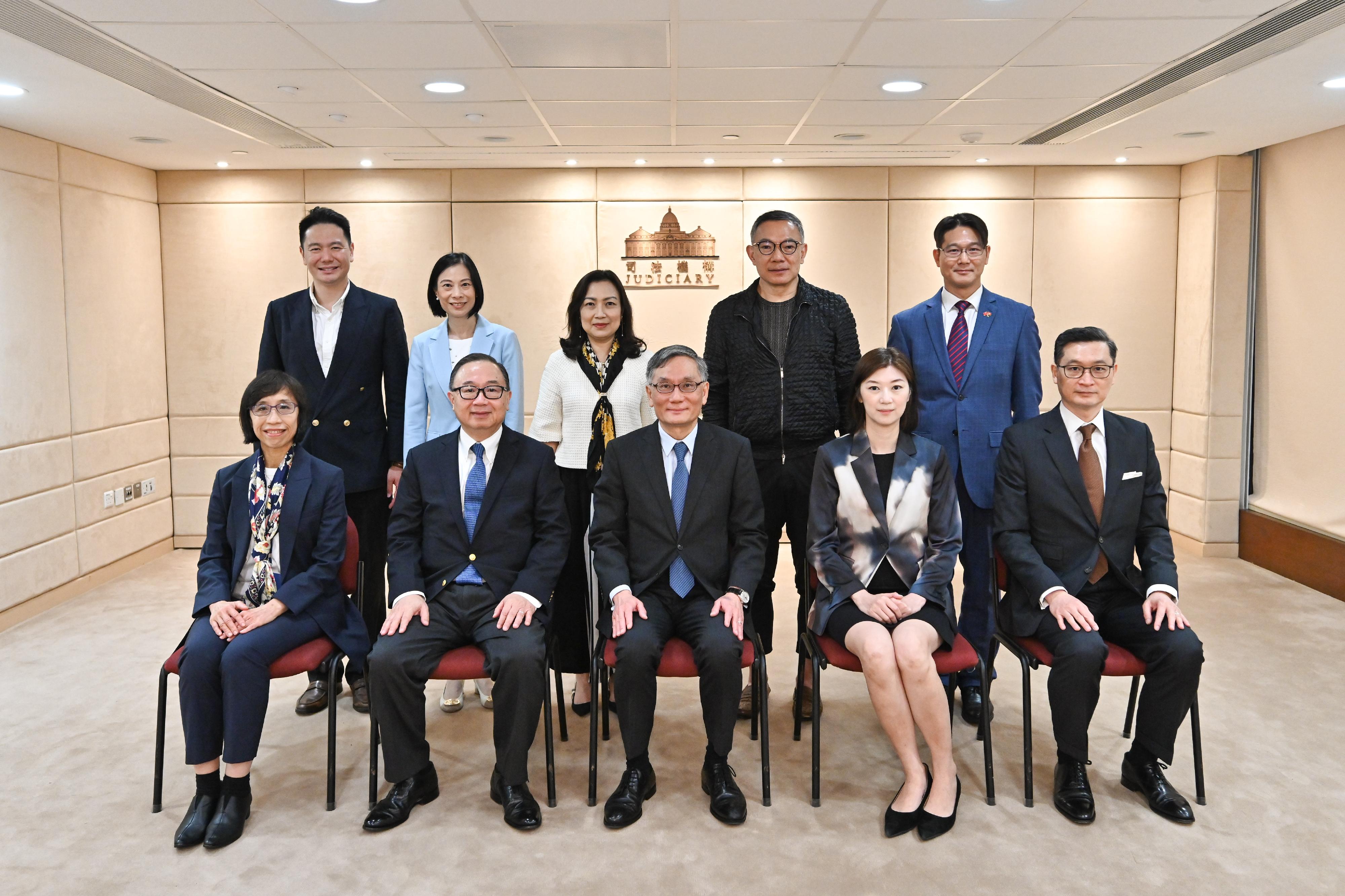 Members of the Legislative Council (LegCo) Panel on Administration of Justice and Legal Services today (June 2) visited the High Court Building and met with members of the Judiciary to exchange views on topical issues relating to the administration of justice. Photo shows (front row, from left) the Judiciary Administrator, Ms Esther Leung Yuet-yin; the Chairman of the LegCo Panel on Administration of Justice and Legal Services, Mr Martin Liao; the Chief Justice of the Court of Final Appeal, Mr Andrew Cheung Kui-nung; the Deputy Chairman of the LegCo Panel on Administration of Justice and Legal Services, Ms Yung Hoi-yan; the Chief Judge of the High Court, Mr Justice Jeremy Poon Shiu-chor; and Panel members (back row, from left) Mr Holden Chow, Ms Maggie Chan, Ms Carmen Kan, Mr Paul Tse and Mr Dennis Leung.