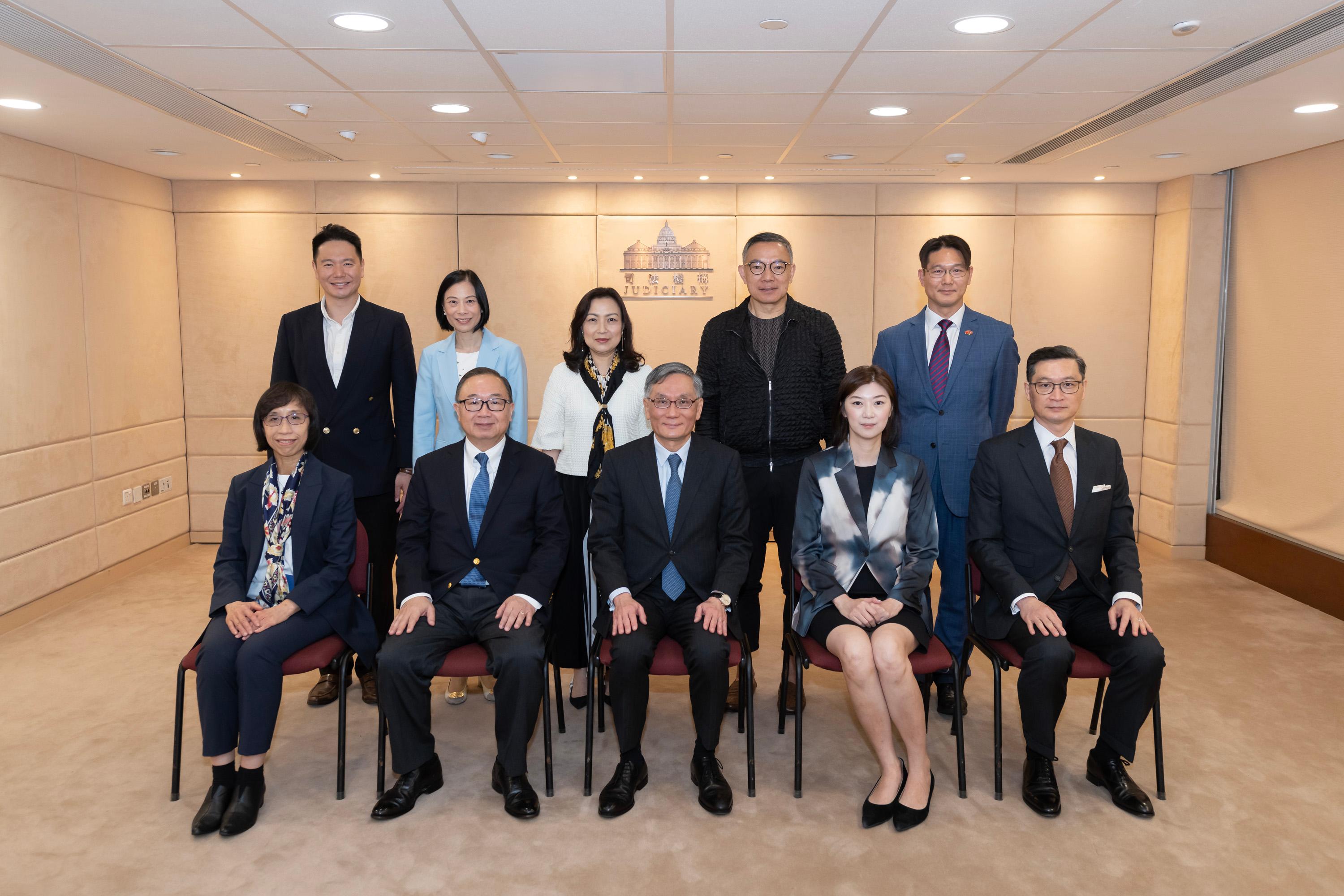 The Legislative Council (LegCo) Panel on Administration of Justice and Legal Services visits the Judiciary at the High Court Building today (June 2) to meet with members of the Judiciary and toured its facilities. Photo shows LegCo Members posing for a group photo with the Chief Justice of the Court of Final Appeal, Mr Andrew Cheung Kui-nung (front row, centre); the Chief Judge of the High Court, Mr Justice Jeremy Poon Shiu-chor (front row, first right); and the Judiciary Administrator, Ms Esther Leung Yuet-yin (front row, first left).