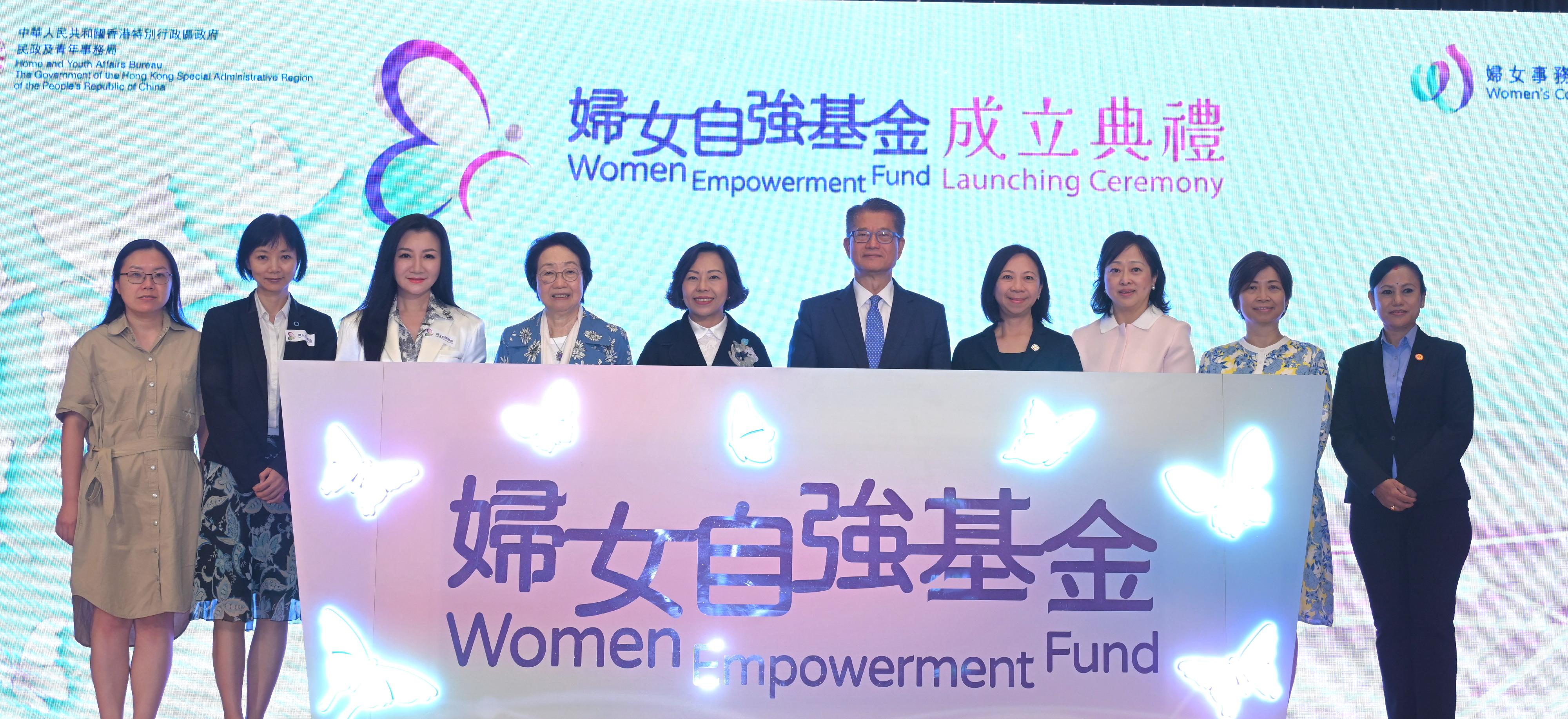 The Financial Secretary, Mr Paul Chan, attended the Women Empowerment Fund Launching Ceremony today (June 8). Photo shows (from fourth left) the Chairperson of the Women's Commission, Ms Chan Yuen-han; the Secretary for Home and Youth Affairs, Miss Alice Mak; Mr Chan; the Permanent Secretary for Home and Youth Affairs, Ms Shirley Lam, and other guests at the ceremony.