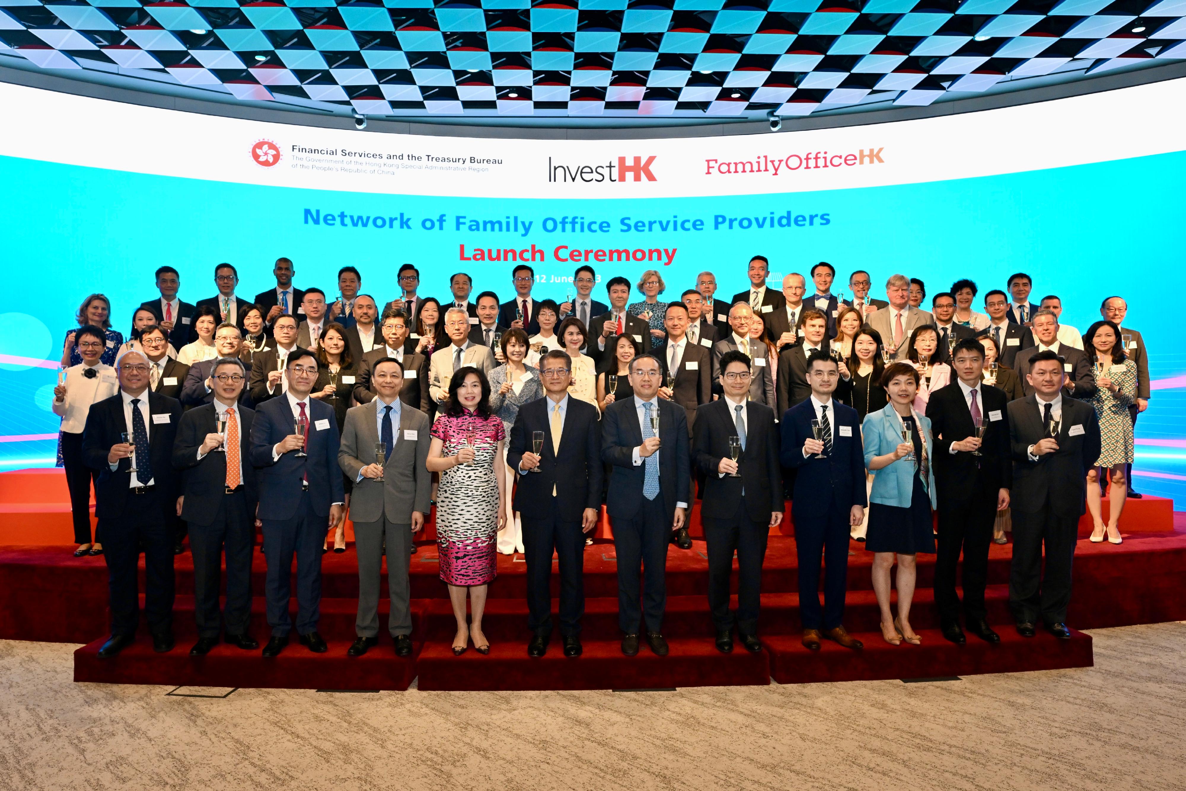The Financial Secretary, Mr Paul Chan, attended the Network of Family Office Service Providers Launch Ceremony today (June 12). Photo shows Mr Chan (first row, sixth left); the Secretary for Financial Services and the Treasury, Mr Christopher Hui (first row, sixth right); the Permanent Secretary for Financial Services and the Treasury (Financial Services), Ms Salina Yan (first row, fifth left); the Under Secretary for Financial Services and the Treasury, Mr Joseph Chan (first row, fifth right); the Executive Director of the Office for Attracting Strategic Enterprises, Mr Charles Ng (first row, first left), and other guests giving a toast at the ceremony.