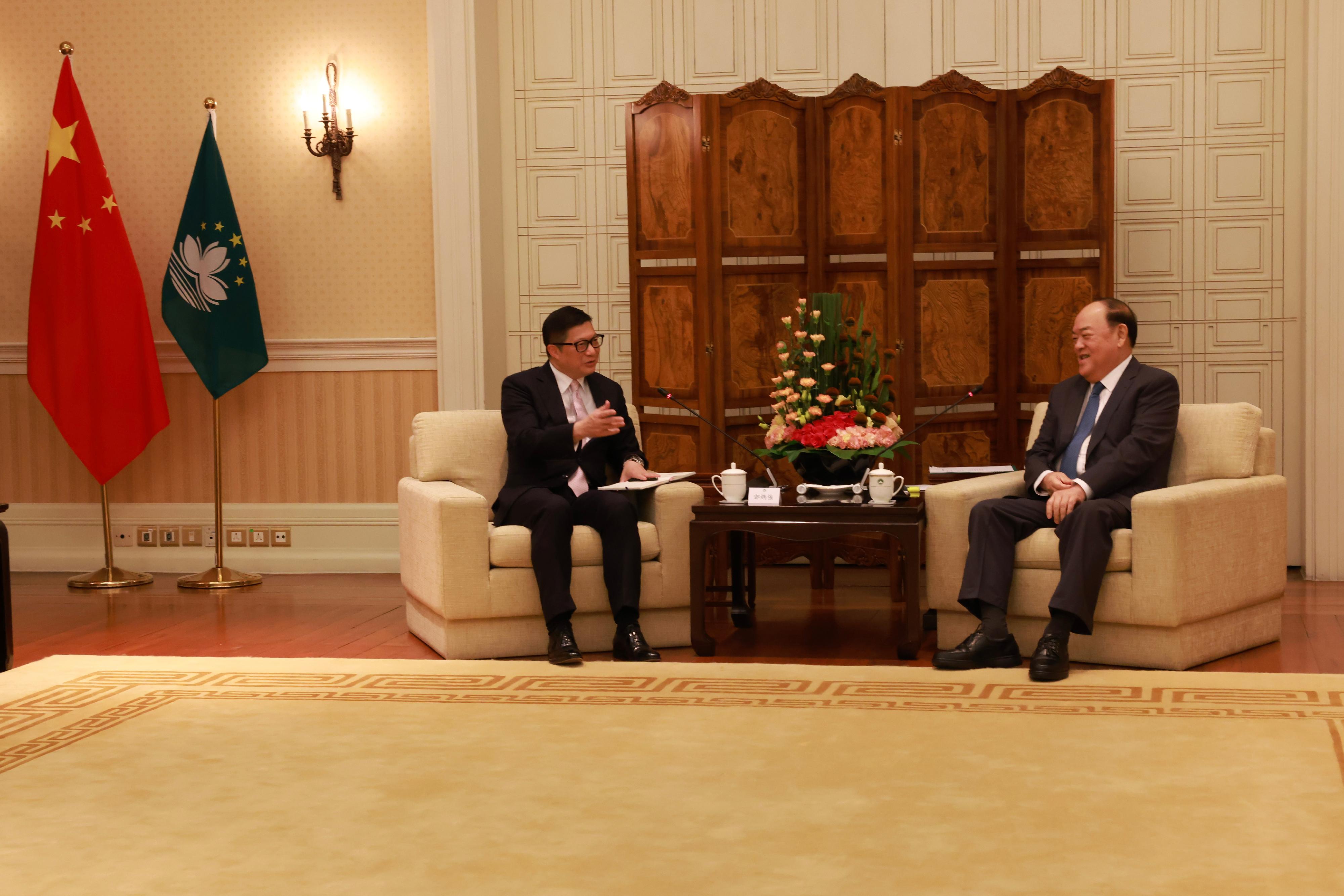 The Secretary for Security, Mr Tang Ping-keung, arrived in Macao this morning (June 20) to start his two-day visit to the Guangdong-Hong Kong-Macao Greater Bay Area and call on public security units there. Photo shows Mr Tang (left) calling on the Chief Executive of the Macao Special Administrative Region, Mr Ho Iat-seng.