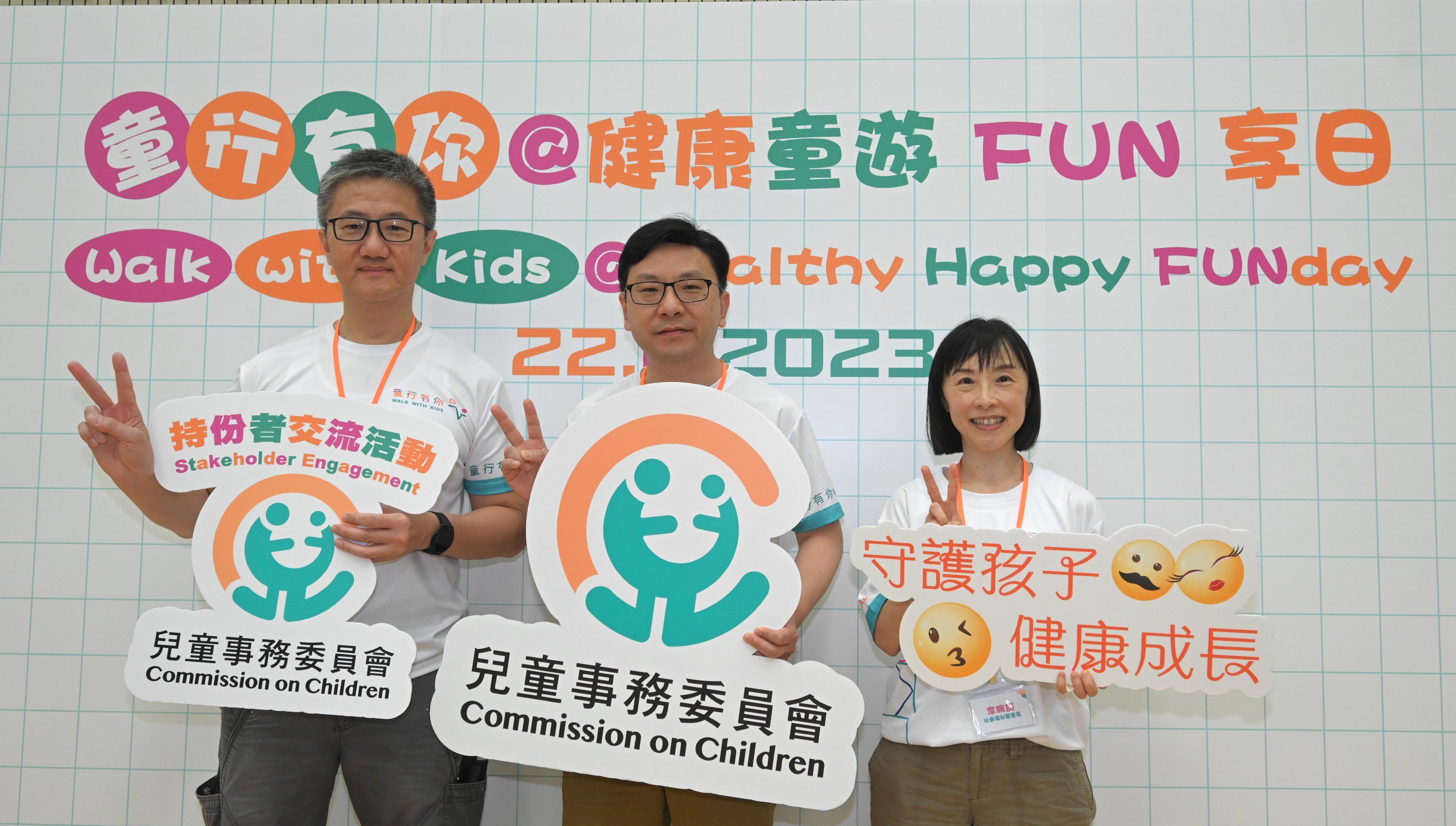 The Commission on Children, the Hong Kong Police Force and the Social Welfare Department today (June 22) jointly held the Walk with Kids@Healthy Happy FUNday at the Junior Police Call Permanent Activity Centre and Integrated Youth Training Camp at Pat Heung. Parents and children joined a variety of interactive games and activities, thereby enhancing their awareness on the importance of physical and mental health. Photo shows (from left) the Commissioner of Police, Mr Siu Chak-yee; the Secretary for Labour and Welfare and Vice-chairperson of the Commission on Children, Mr Chris Sun; and the Director of Social Welfare, Miss Charmaine Lee, at the event.