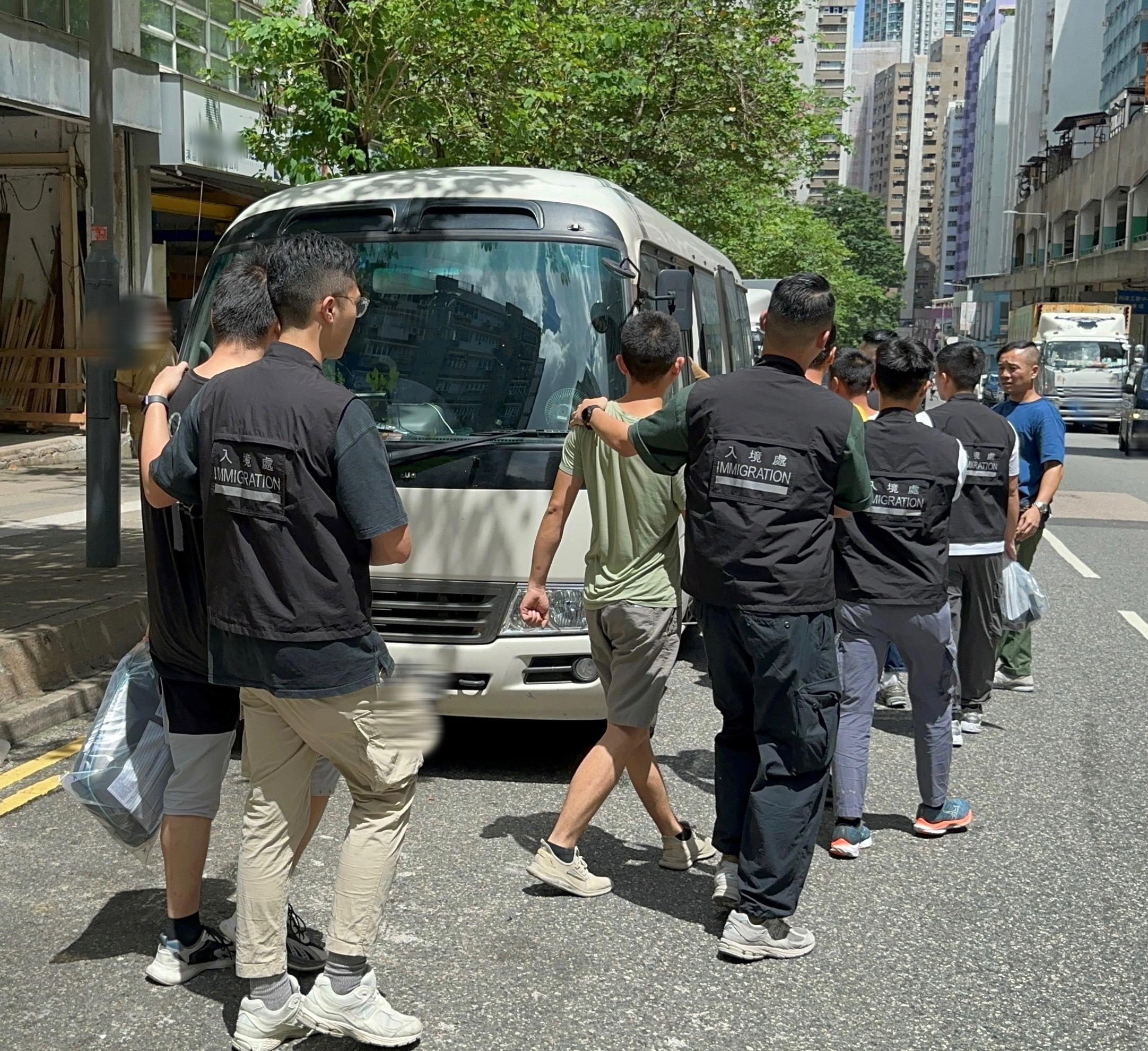 The Immigration Department mounted a series of territory-wide anti-illegal worker operations codenamed "Twilight", and joint operations with the Hong Kong Police Force codenamed "Champion" and "Windsand", for four consecutive days from June 26 to yesterday (June 29). Photo shows suspected illegal workers arrested during an operation.