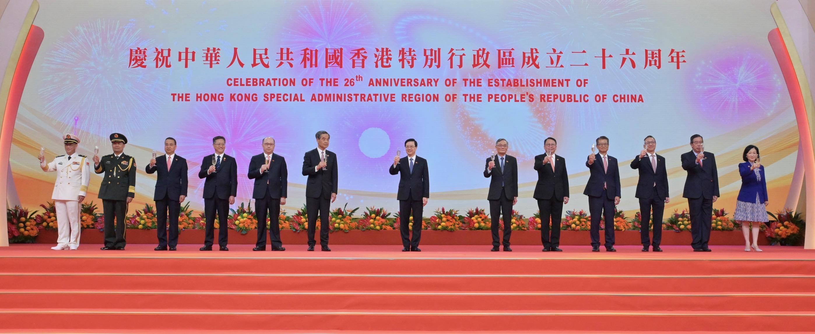 The Chief Executive, Mr John Lee, together with Principal Officials and guests, attended the reception for the 26th anniversary of the establishment of the Hong Kong Special Administrative Region (HKSAR) at the Hong Kong Convention and Exhibition Centre this morning (July 1). Photo shows (from left) the Political Commissar of the Chinese People's Liberation Army Hong Kong Garrison, Navy Rear Admiral Lai Ruxin; the Commander-in-chief of the Chinese People's Liberation Army Hong Kong Garrison, Major General Peng Jingtang; the Commissioner of the Ministry of Foreign Affairs in the HKSAR, Mr Liu Guangyuan; Deputy Head of the Office for Safeguarding National Security of the Central People's Government in the HKSAR Mr Li Jiangzhou; the Director of the Liaison Office of the Central People's Government in the HKSAR, Mr Zheng Yanxiong; Vice-Chairman of the National Committee of the Chinese People's Political Consultative Conference Mr C Y Leung; Mr Lee; the Chief Justice of the Court of Final Appeal, Mr Andrew Cheung Kui-nung; the Chief Secretary for Administration, Mr Chan Kwok-ki; the Financial Secretary, Mr Paul Chan; the Secretary for Justice, Mr Paul Lam, SC; the President of the Legislative Council, Mr Andrew Leung; and the Convenor of the Non-official Members of the Executive Council, Mrs Regina Ip, proposing a toast.