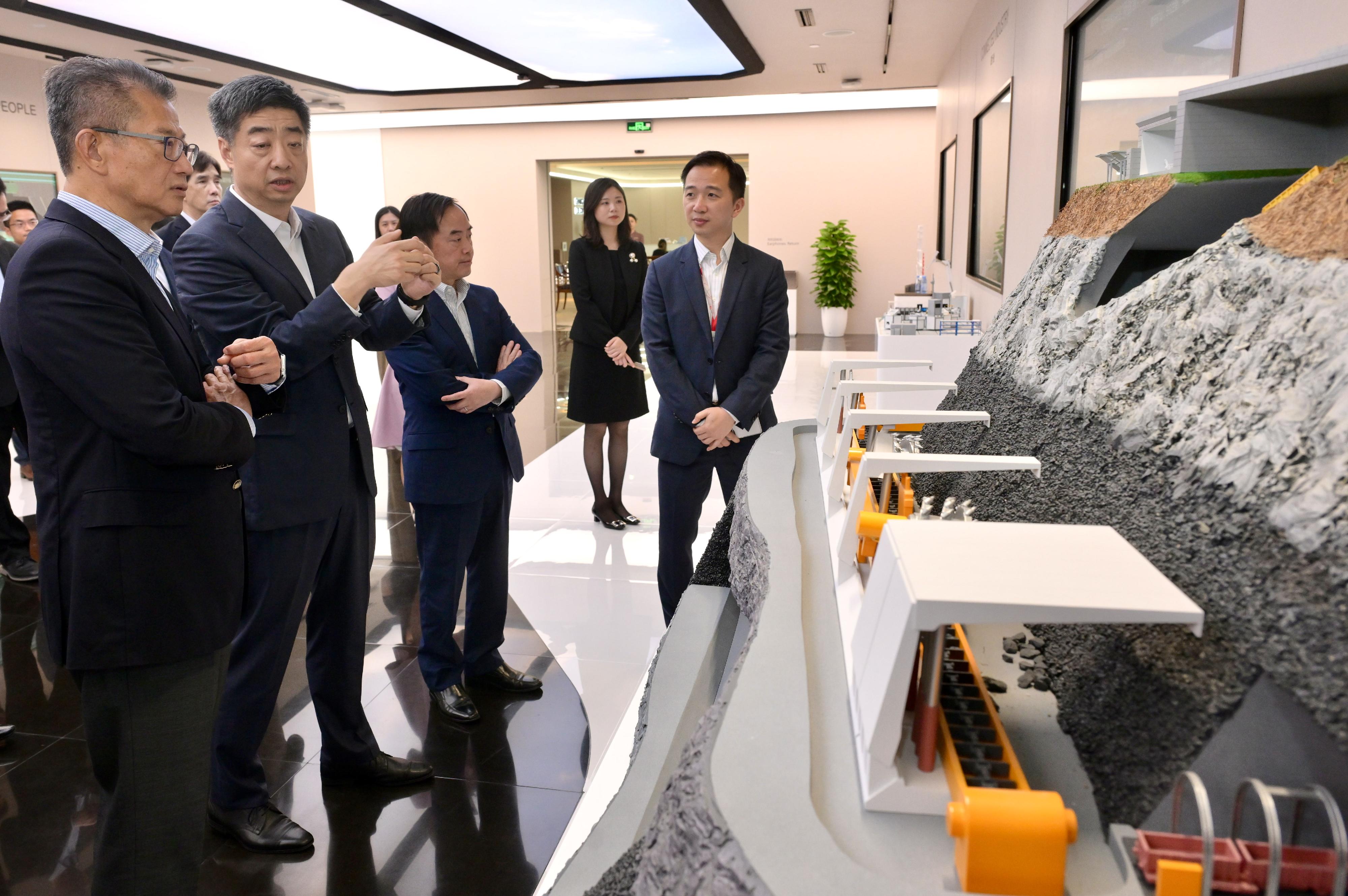 The Financial Secretary, Mr Paul Chan, started his visit programme in Shanghai today (July 5). Photo shows Mr Chan (first left), accompanied by the Government Chief Information Officer, Mr Tony Wong (third left), and Deputy Chairman of the Board and Rotating Chairman of Huawei Mr Hu Houkun (second left), touring the Shanghai Research Center of Huawei.