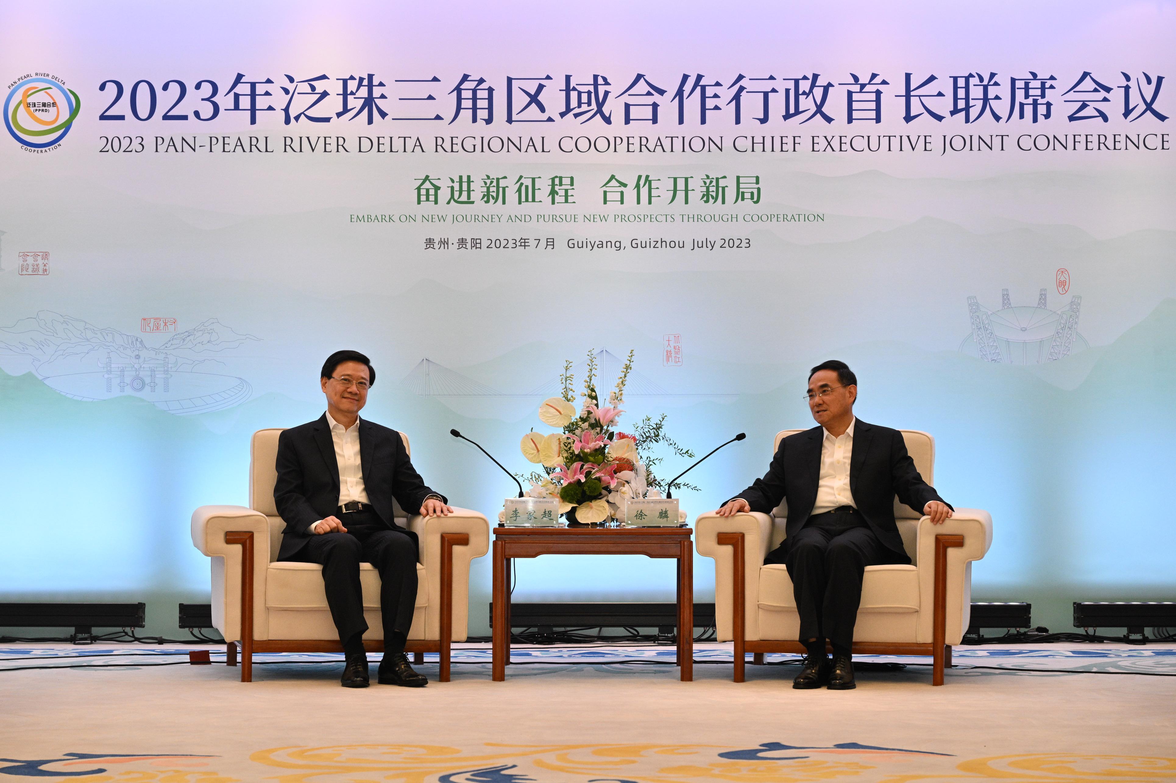 The Chief Executive, Mr John Lee, led a delegation to start his visit programme in Guiyang today (July 6). Photo shows Mr Lee (left) meeting with the Secretary of the CPC Guizhou Provincial Committee and Director of the Standing Committee of the Guizhou Provincial People's Congress, Mr Xu Lin (right), in Guiyang.