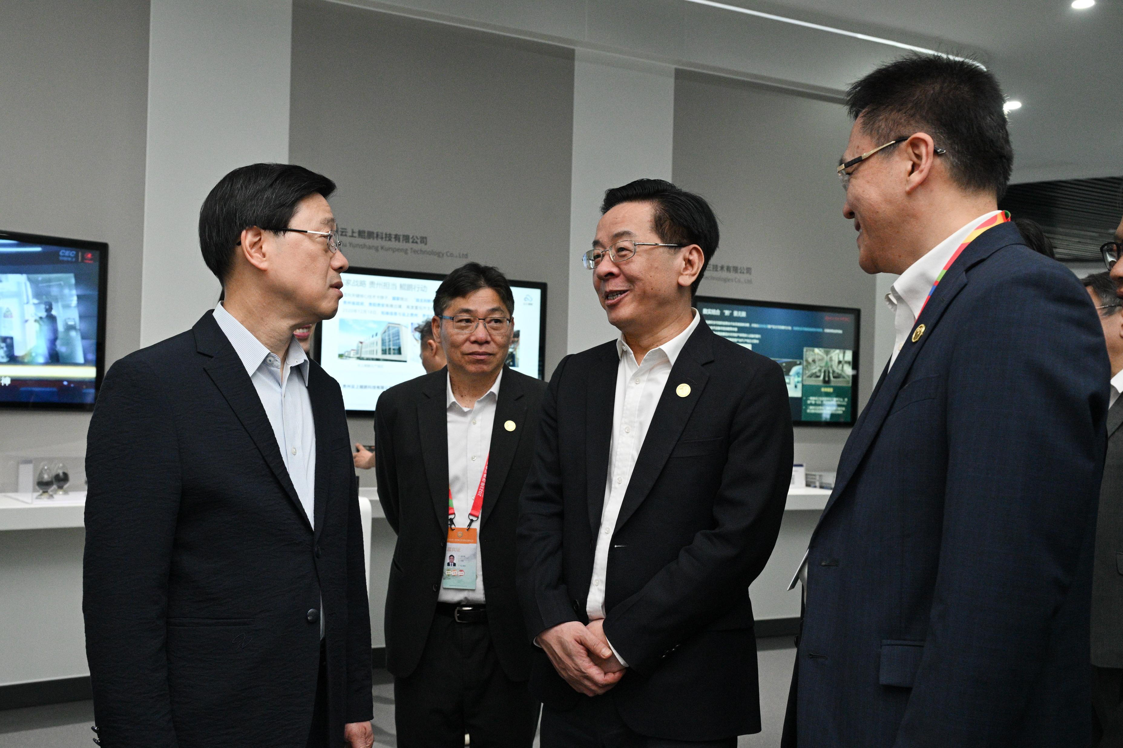 The Chief Executive, Mr John Lee, led a delegation to start his visit programme in Guiyang, today (July 6). Photo shows Mr Lee (first left); member of the Standing Committee and Head of the Publicity Department of the Guizhou CPC Provincial Committee, Mr Lu Yongzheng (second right); the Secretary for Transport and Logistics, Mr Lam Sai-hung (second left); and the Secretary for Innovation, Technology and Industry, Professor Sun Dong (first right), visiting the National Big Data (Guizhou) Comprehensive Pilot Zone Communication and Experience Center.