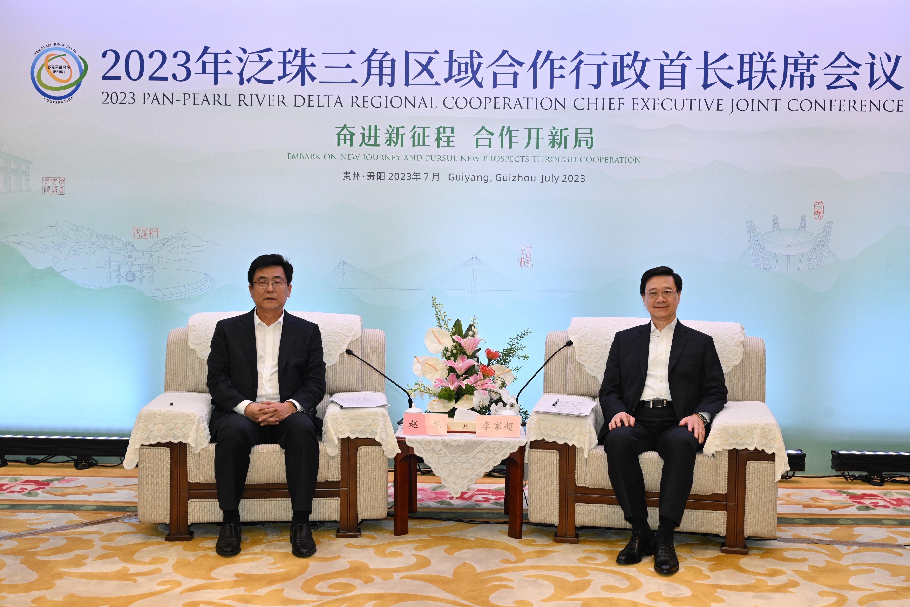 The Chief Executive, Mr John Lee, led a delegation to start his visit programme in Guiyang today (July 6). Photo shows Mr Lee (right) and the Governor of Fujian Province, Mr Zhao Long (left), at a bilateral meeting in Guiyang.