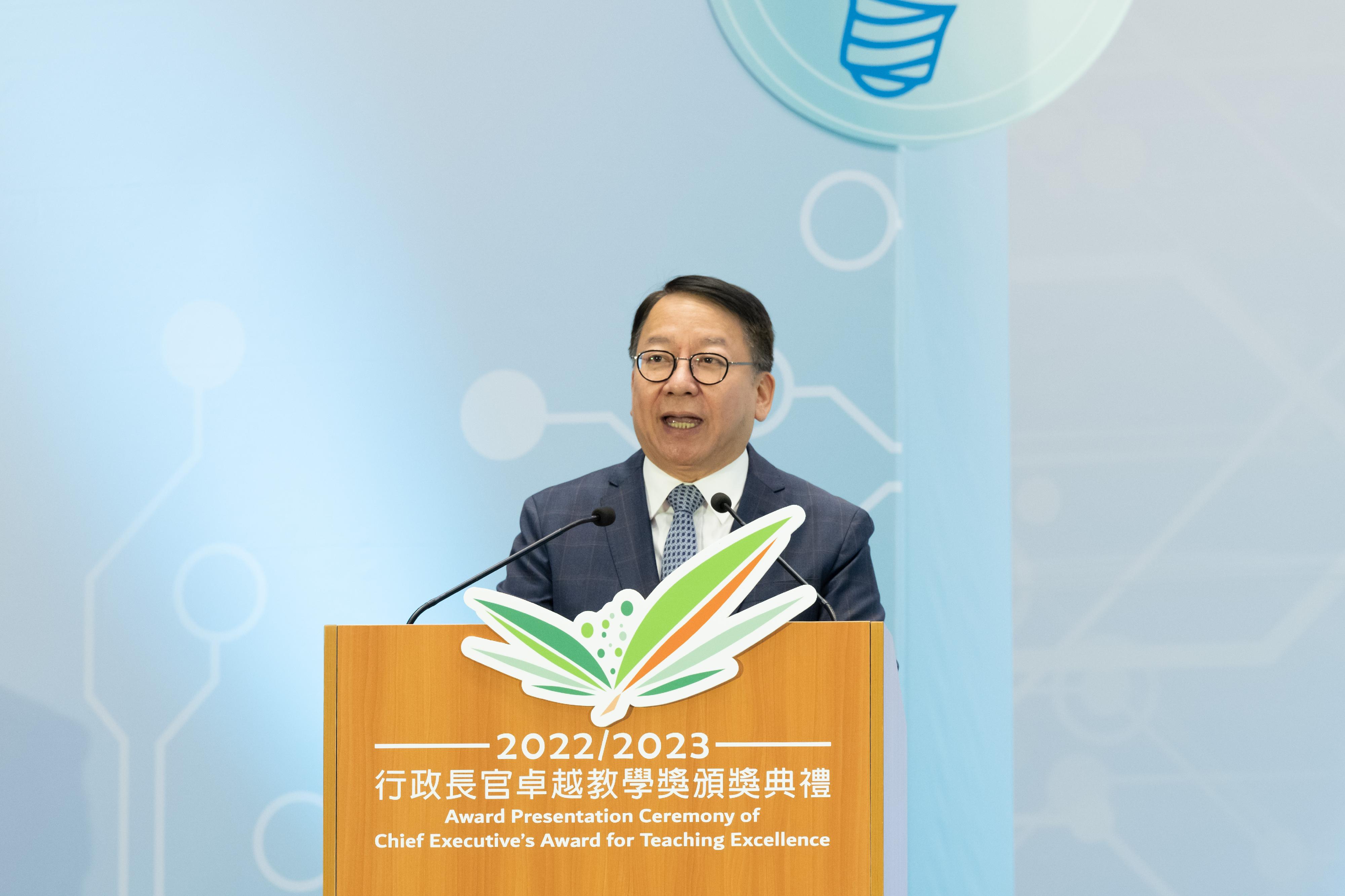 The Acting Chief Executive, Mr Chan Kwok-ki, speaks at the Award Presentation Ceremony of the Chief Executive's Award for Teaching Excellence (2022/2023) today (July 7). 