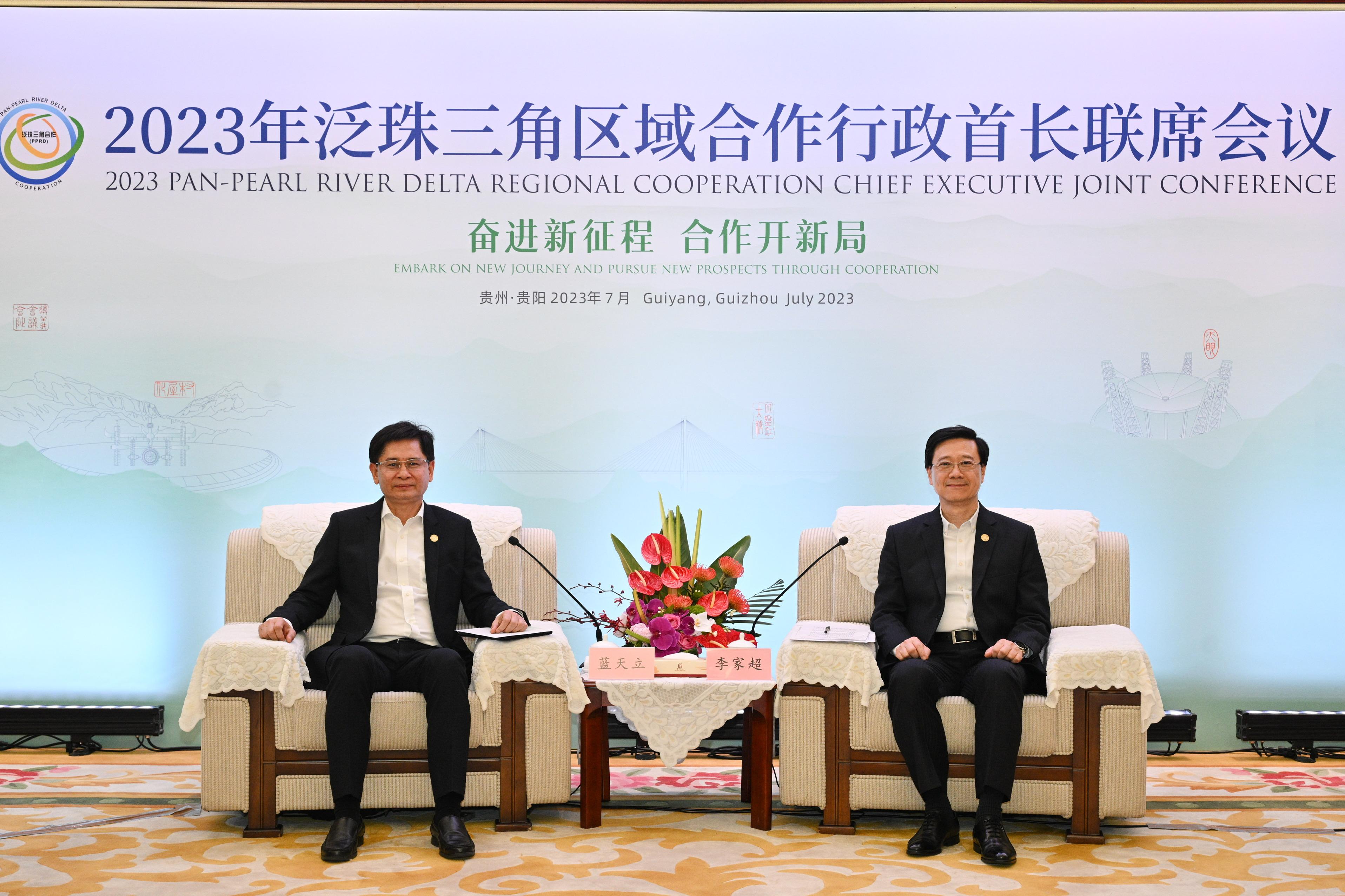 The Chief Executive, Mr John Lee, led a delegation to visit Guiyang today (July 7). Photo shows Mr Lee (right) and the Chairman of the Guangxi Zhuang Autonomous Region, Mr Lan Tianli (left), at a bilateral meeting in Guiyang.