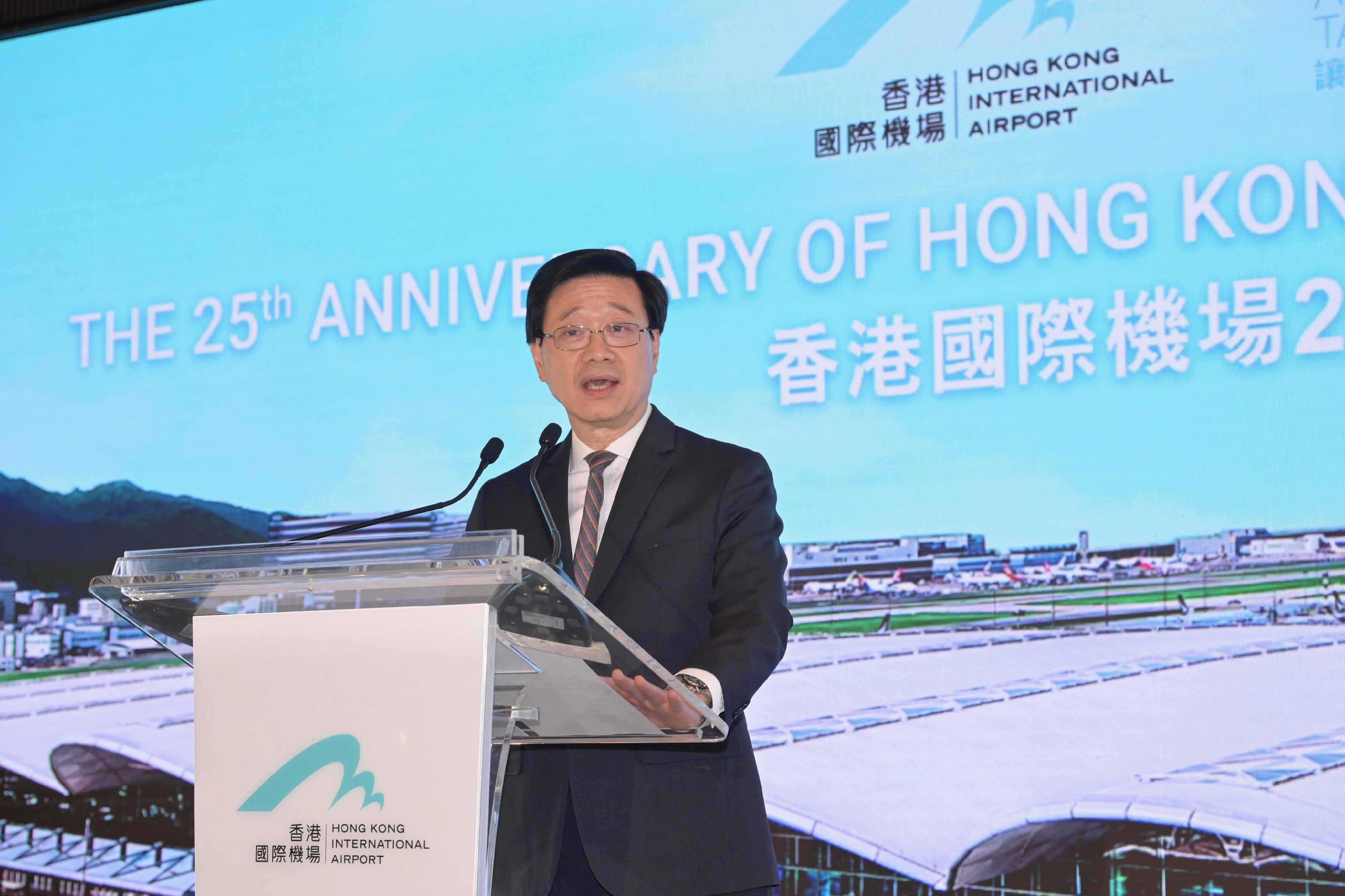 The Chief Executive, Mr John Lee, speaks at the cocktail reception in celebration of the 25th anniversary of Hong Kong International Airport today (July 10).