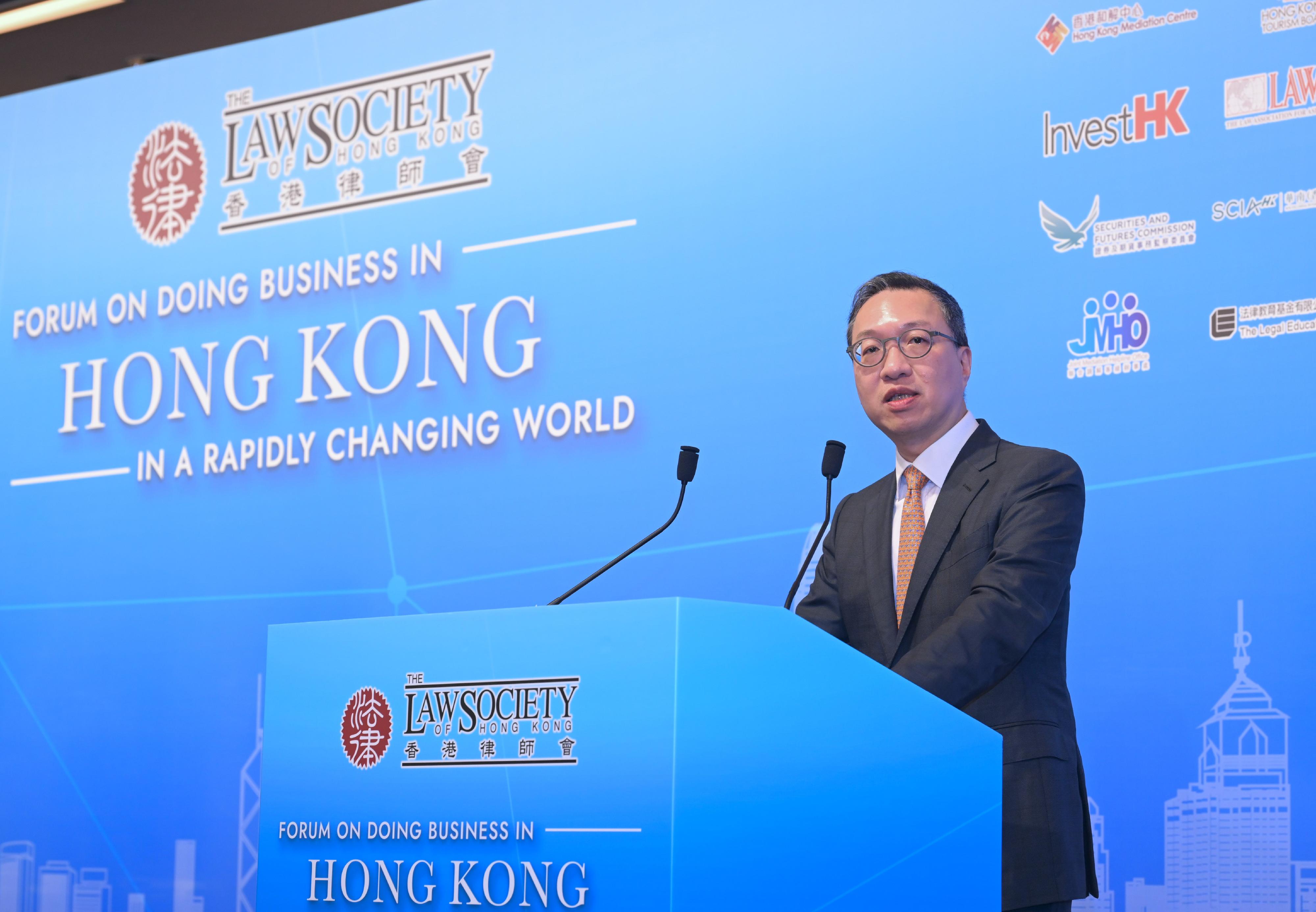 The Secretary for Justice, Mr Paul Lam, SC, speaks at the Law Society of Hong Kong's Forum on Doing Business in Hong Kong in a Rapidly Changing World today (July 11).