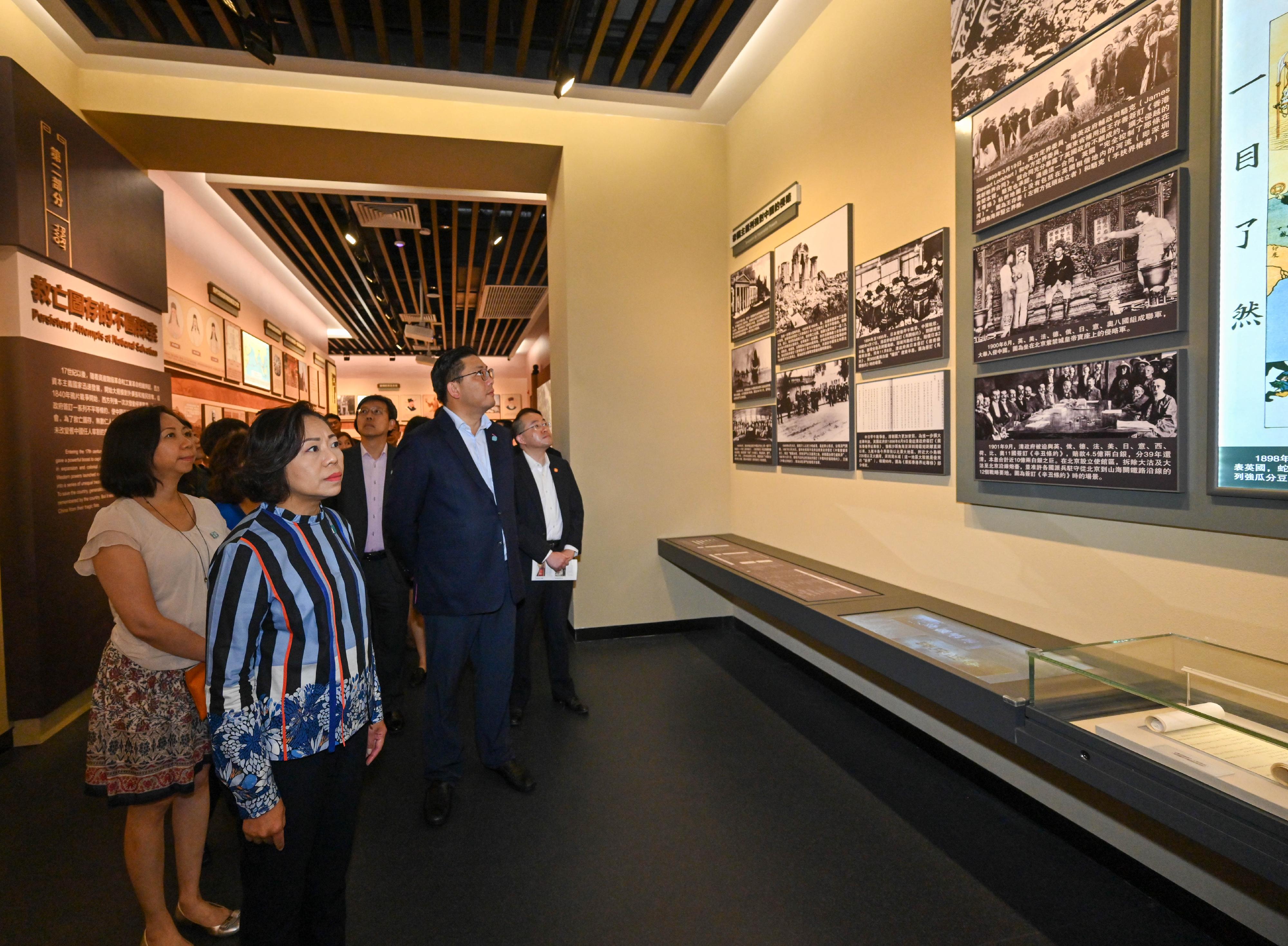 The Secretary for Home and Youth Affairs, Miss Alice Mak (second left); the Permanent Secretary for Home and Youth Affairs, Ms Shirley Lam (first left); and the Under Secretary for Home and Youth Affairs, Mr Clarence Leung (fourth left), today (July 11) visited the Chinese People's Liberation Army Hong Kong Garrison Exhibition Center at Ngong Shuen Chau Barracks and viewed the exhibition panels at the Center.

