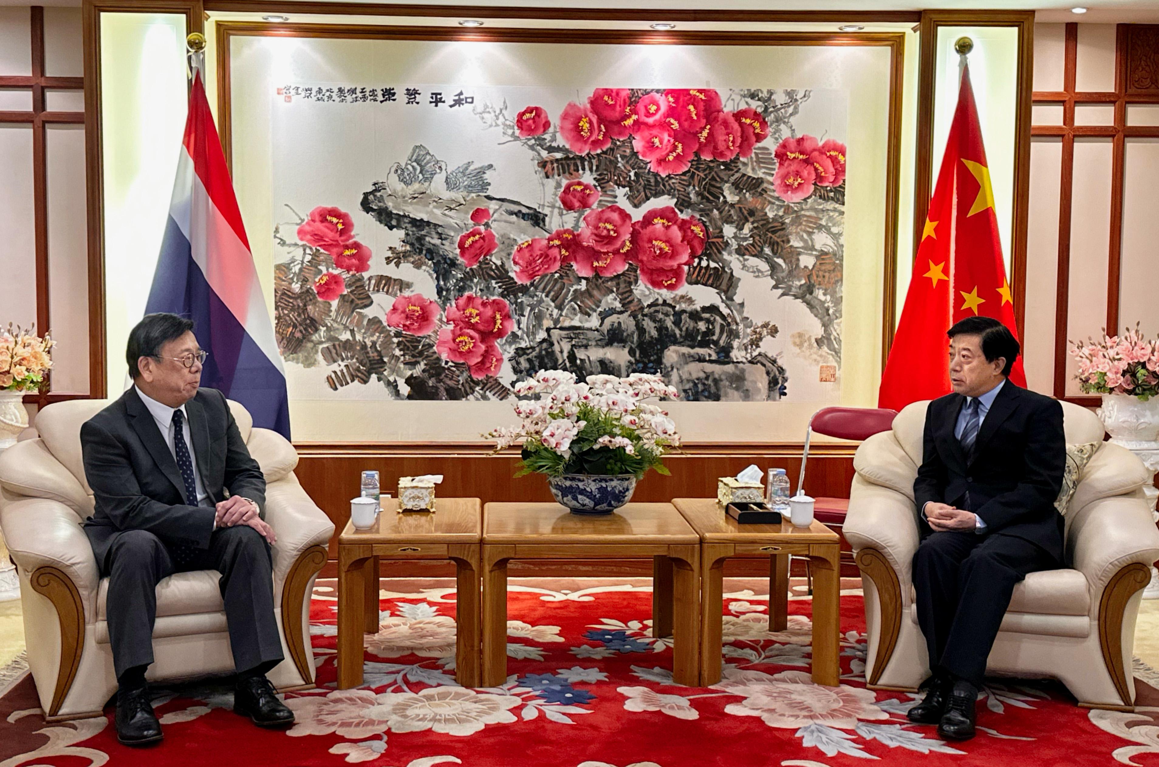 The Secretary for Commerce and Economic Development, Mr Algernon Yau (left), pays a courtesy call on the Chinese Ambassador to Thailand, Mr Han Zhiqiang (right), in Bangkok, Thailand, today (July 13).