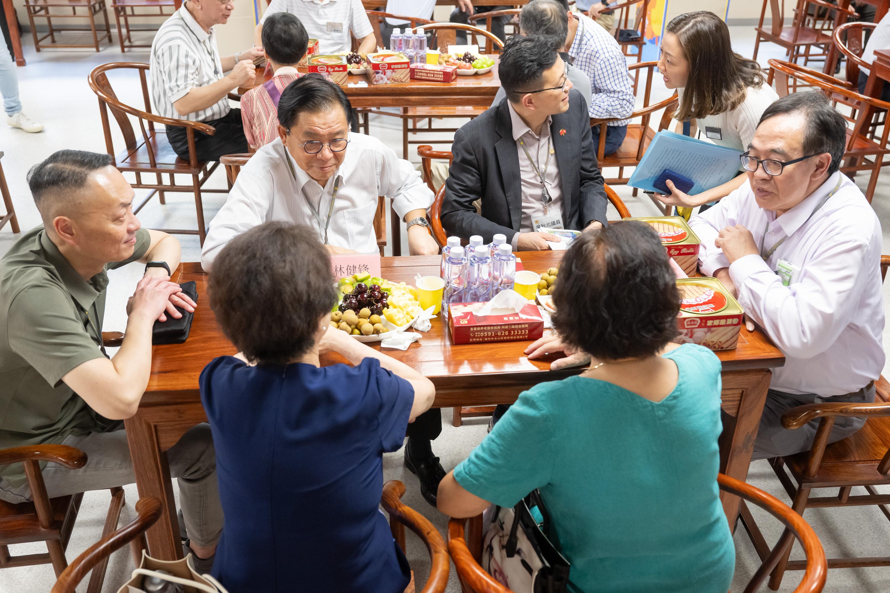 The Legislative Council (LegCo) delegation, led by the President of LegCo, Mr Andrew Leung, continues its study visit in Fuzhou, Fujian province today (July 16). Photo shows the delegation visiting elderly people from Hong Kong residing in Fuzhou to learn more about their retirement protection and lives in the city.