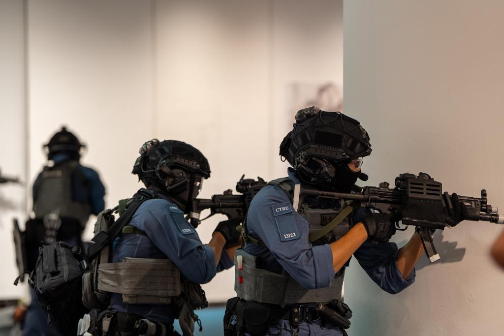 Police held a counter-terrorism exercise codenamed "PURPLEFLAME" at the Hong Kong City Hall in the early hours today (July 19). Picture shows the officers staging a tactical intervention to subdue terrorists.