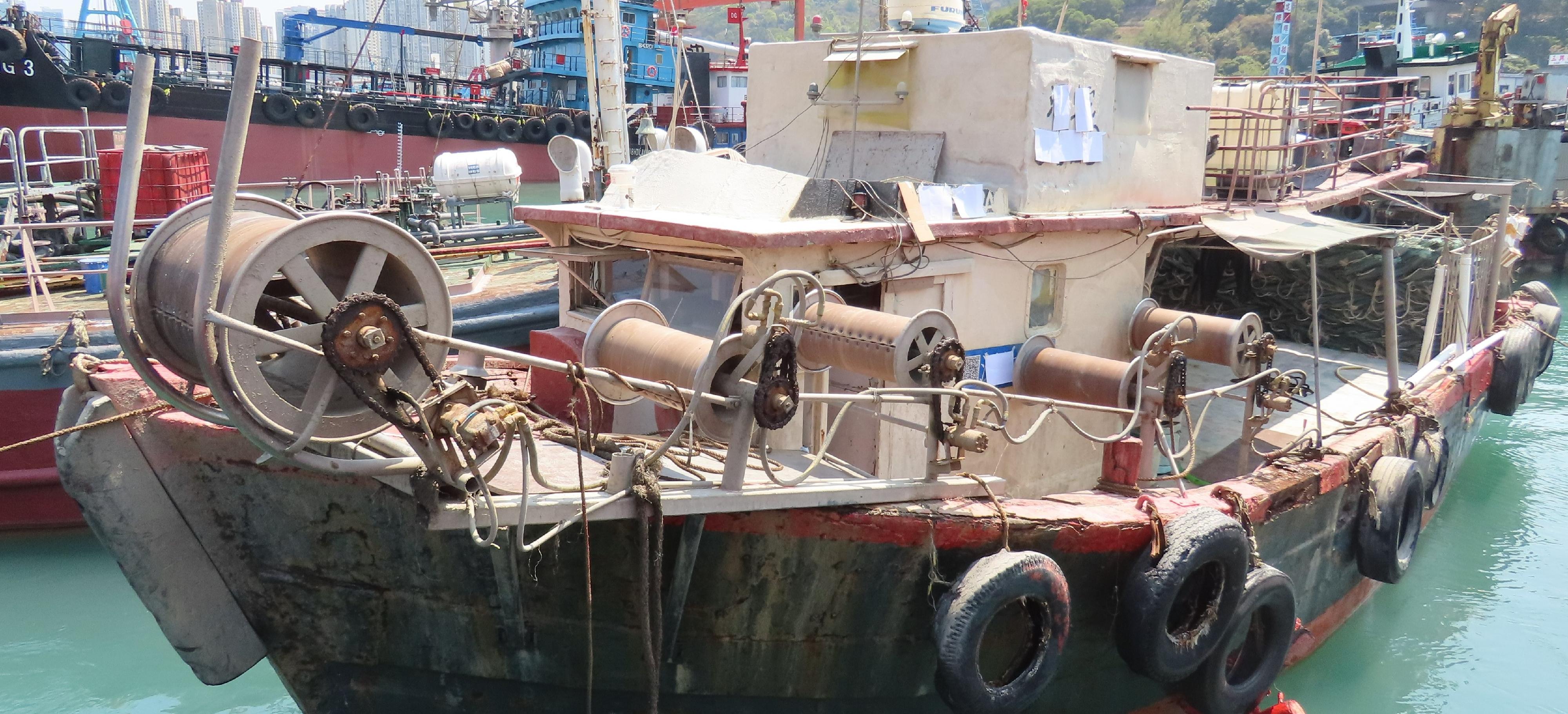 Five Mainland fishermen deckhands engaged in fishing using snake cages (a type of cage traps that has been banned in Hong Kong waters) earlier in waters near Shek Pik in southern Hong Kong, and a local coxswain on board were charged with breaching the Fisheries Protection Ordinance (Cap. 171) and convicted today (July 19). Photo shows the fishing vessel.