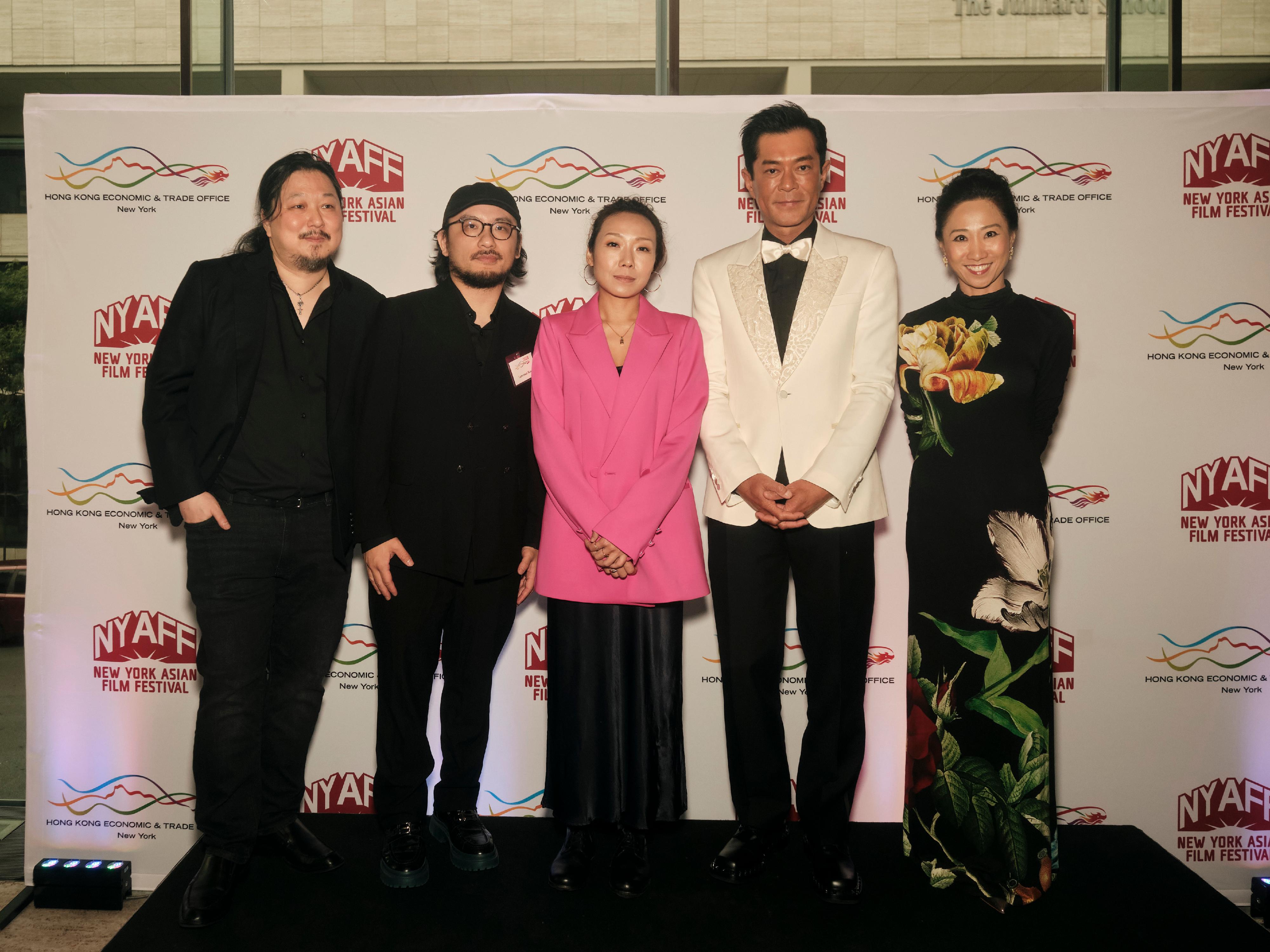 The Hong Kong Economic and Trade Office in New York (HKETONY) hosted a special reception honouring Hong Kong megastar Louis Koo, who was presented with the Extraordinary Star Asia Award for Exceptional Contribution to Asian Cinema by the New York Asian Film Festival (NYAFF) on July 19 (New York time). Pictured at the reception are (from right to left): the Director of the HKETONY, Ms Candy Nip; Koo; Director of "Vital Signs" Cheuk Wan-chi; Director of "In Broad Daylight" Lawrence Kan; and the Executive Director of the NYAFF, Mr Samuel Jamier.