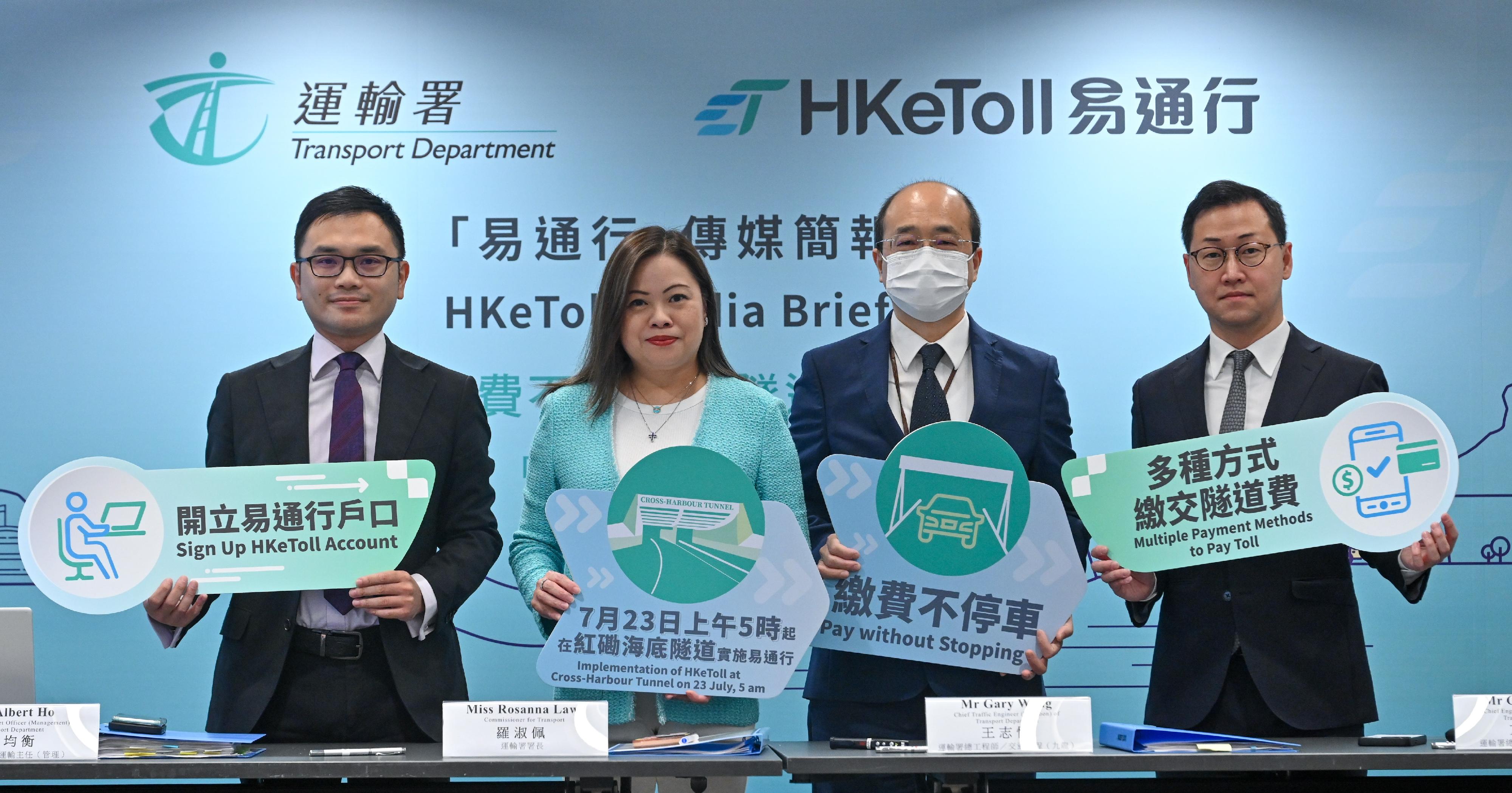 The Commissioner for Transport, Miss Rosanna Law (second left); the Principal Transport Officer (Management), Mr Albert Ho (first left); the Chief Traffic Engineer (Kowloon), Mr Gary Wong (second right); and the Chief Engineer (Smart Mobility), Mr George Fong (first right), of the Transport Department held a briefing today (July 20) to introduce the implementation of the HKeToll in the Cross-Harbour Tunnel from 5am on July 23.