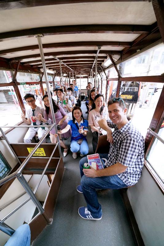 The Anti-Deception Coordination Centre of the Hong Kong Police organised a tram tour today (July 20). Picture shows the officiating guests on board the tram adorned with the latest anti-deception promotional messages.