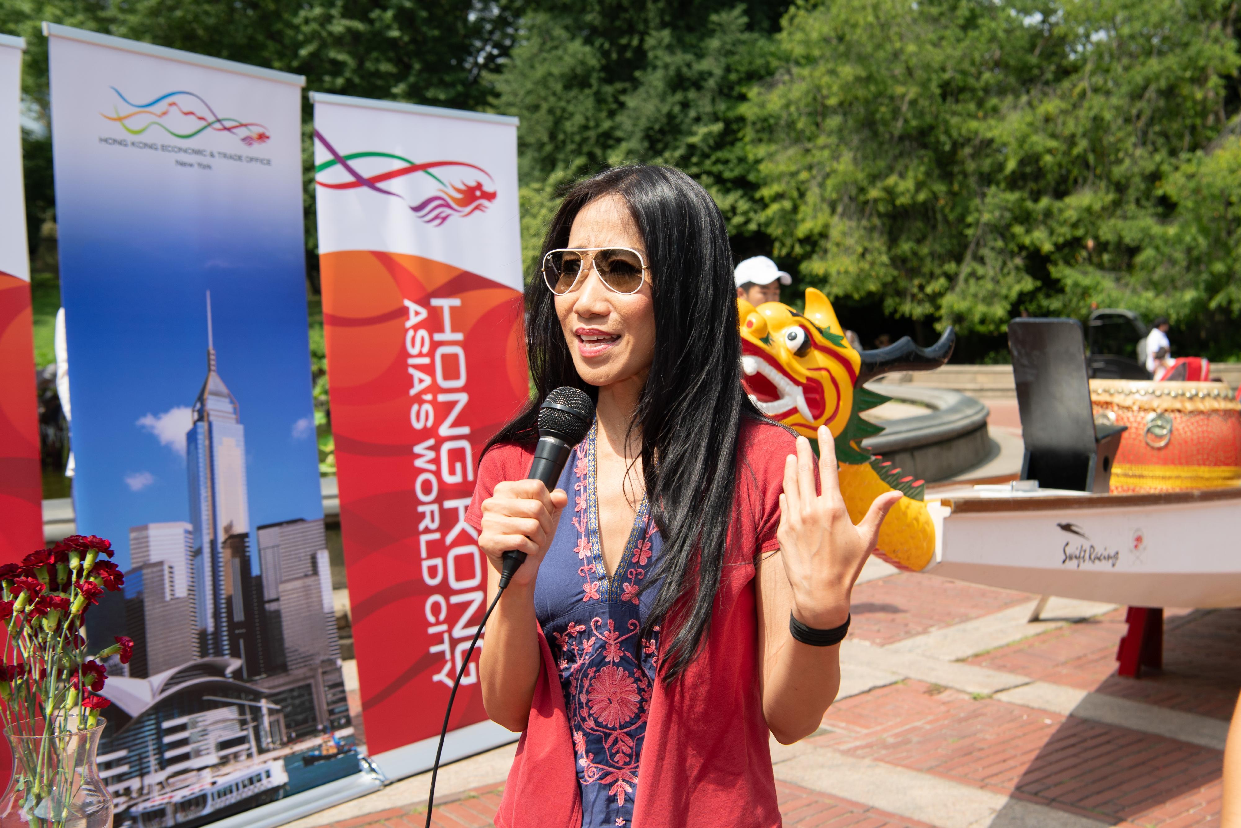 The Director of Hong Kong Economic and Trade Office, New York, Ms Candy Nip, speaks at the eye-dotting ceremony of the Hong Kong Dragon Boat Festival in New York held at Central Park on July 20, New York time.