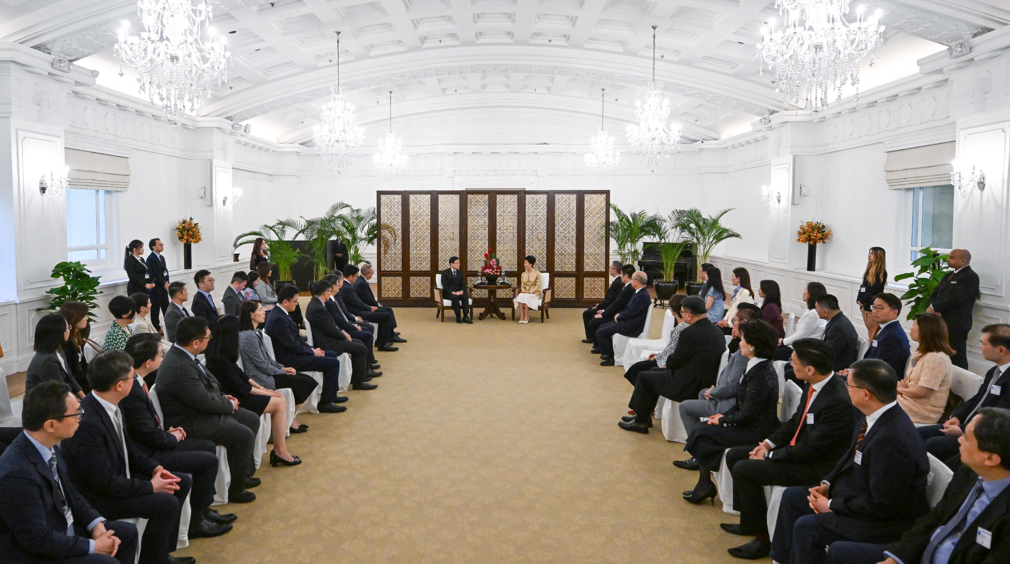 The Chief Executive, Mr John Lee, led a Hong Kong Special Administrative Region delegation to arrive at Singapore this afternoon (July 23) and begin the visit programme in three countries of the Association of Southeast Asian Nations. Photo shows Mr Lee meeting with the Ambassador Extraordinary and Plenipotentiary of the People's Republic of China to the Republic of Singapore, Ms Sun Haiyan.