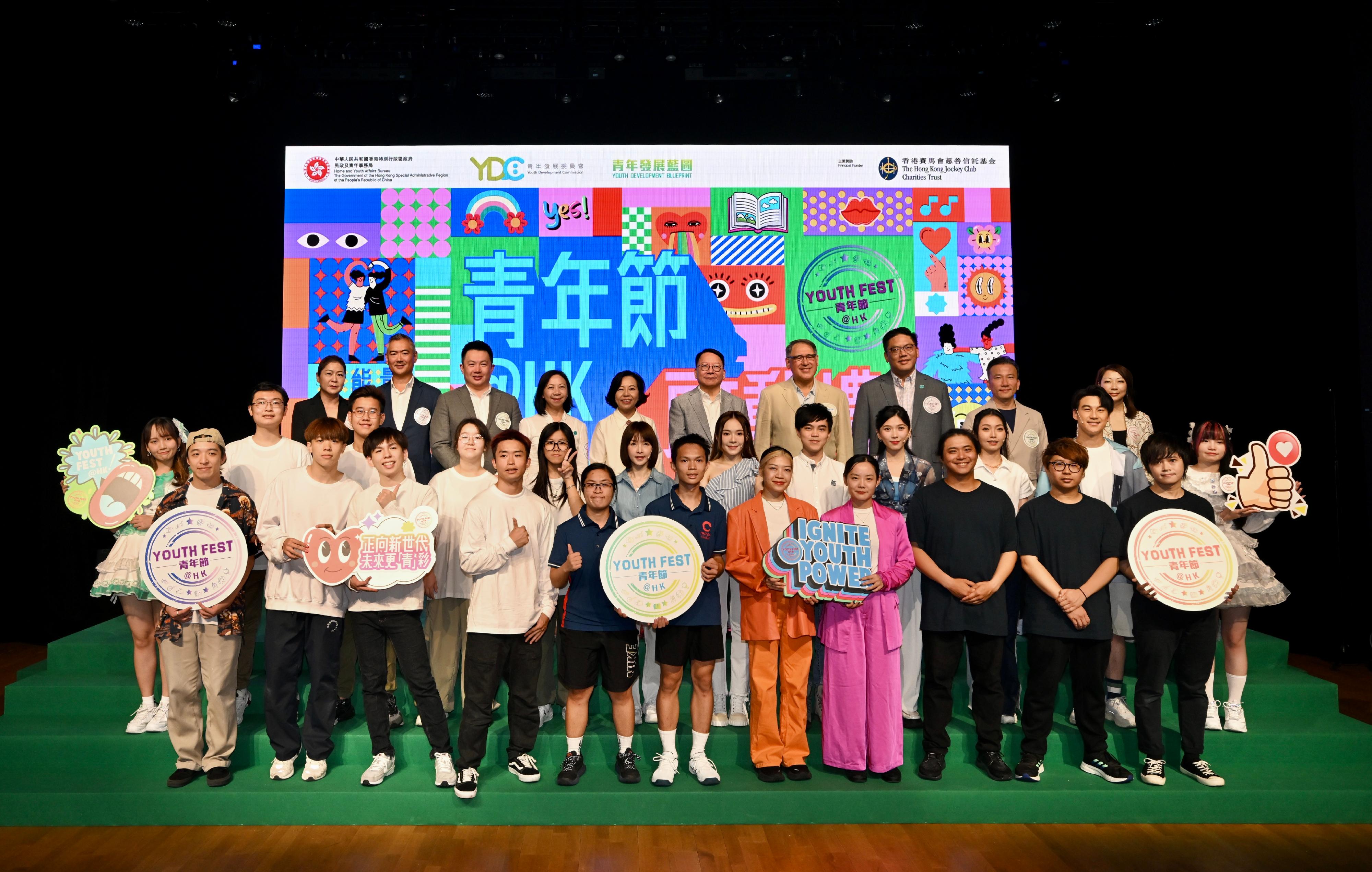 The Acting Chief Executive, Mr Chan Kwok-ki, attended the Kick-off Ceremony of the 2023 youthfest@HK today (July 26). Photo shows Mr Chan (third row, fifth right); the Secretary for Home and Youth Affairs, Miss Alice Mak (third row, fifth left); the Vice-Chairman of the Youth Development Commission, Mr Kenneth Leung (third row, third left); Steward of the Hong Kong Jockey Club Mr Lester Huang (third row, fourth right), and other guests with performers at the ceremony.