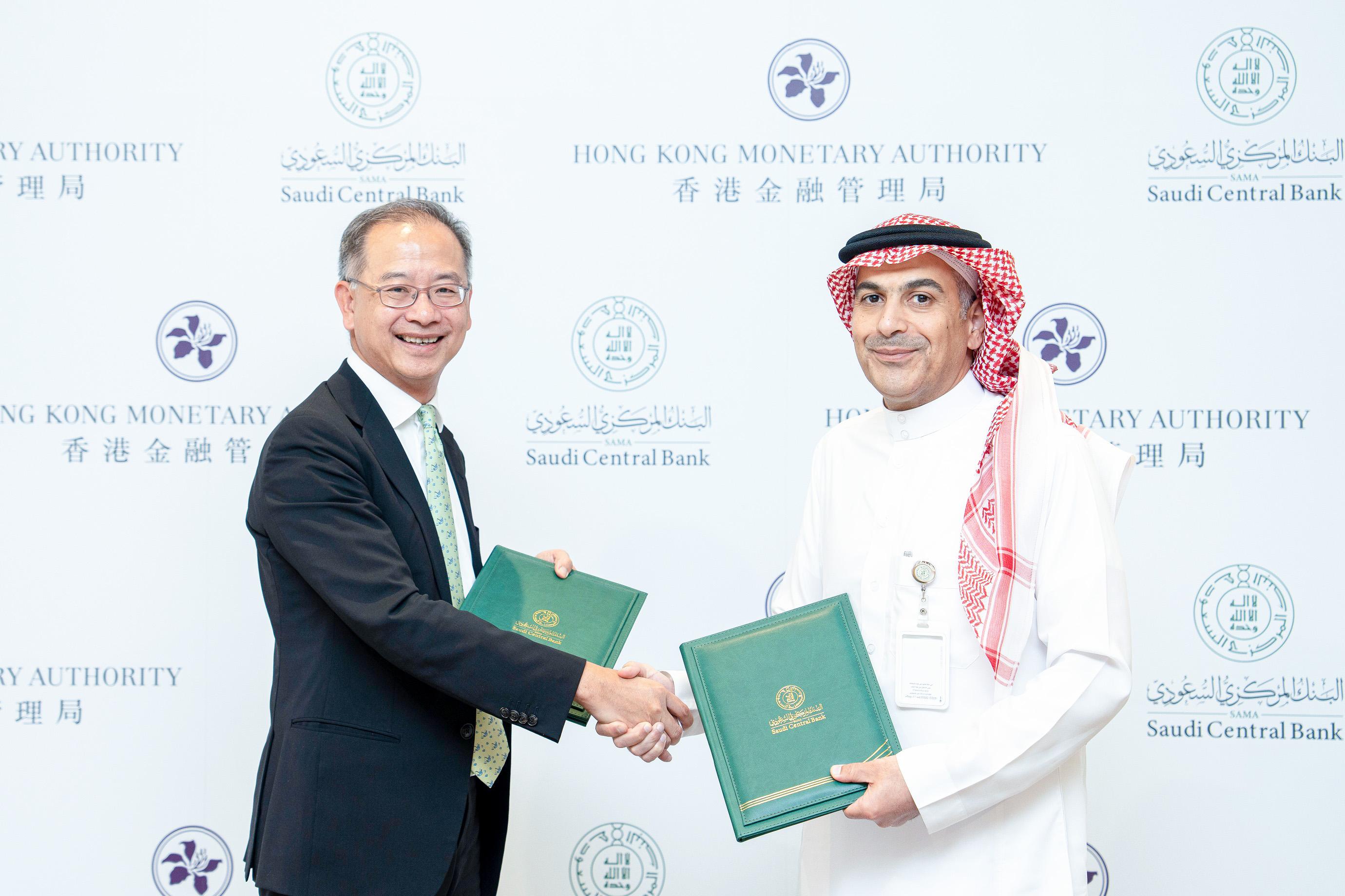 The Chief Executive of the Hong Kong Monetary Authority, Mr Eddie Yue (left) and the Governor of the Saudi Central Bank, Mr Ayman Alsayari (right) signed a Memorandum of Understanding on July 26 (Riyadh time) to promote collaboration on financial innovation.