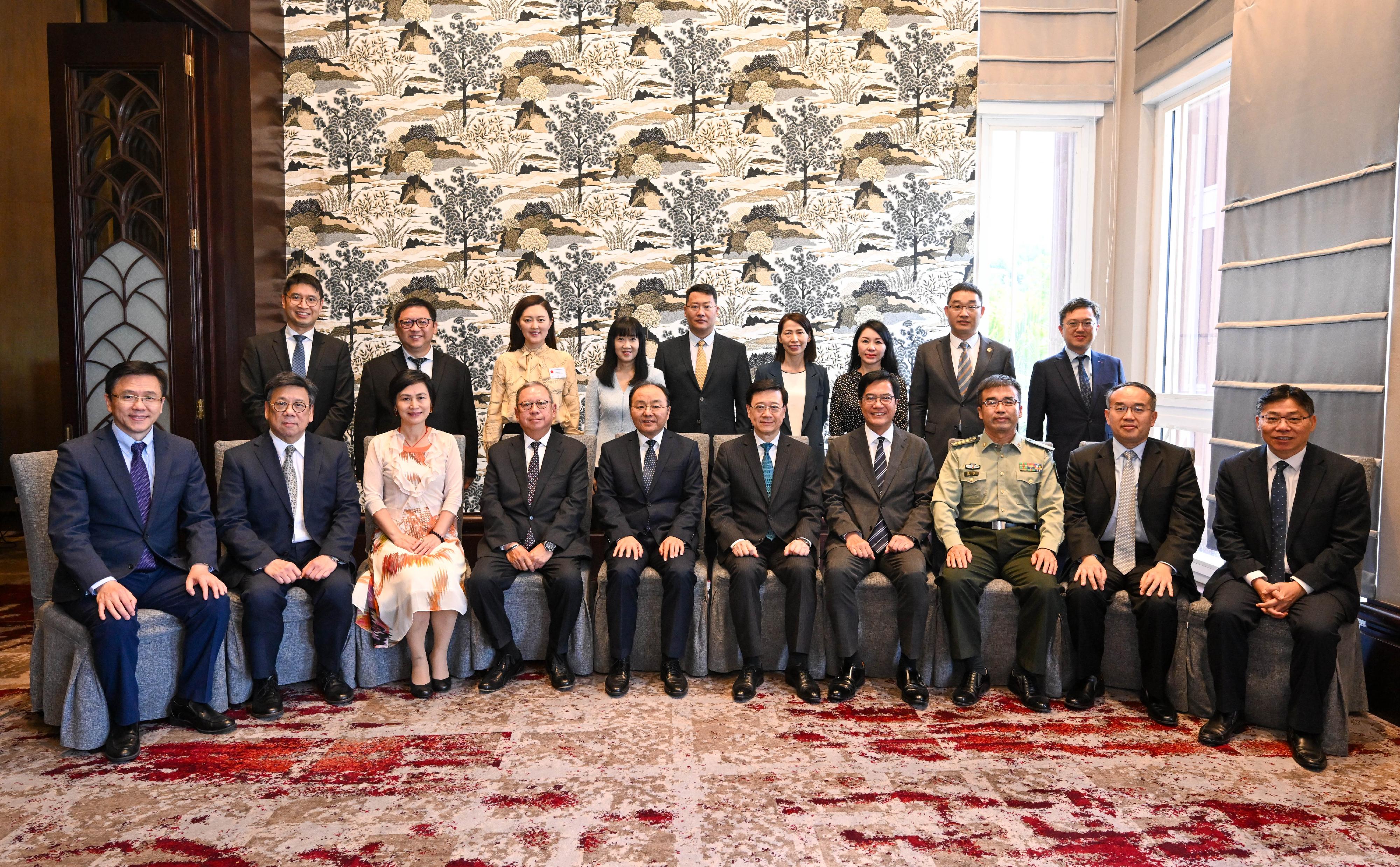 The Chief Executive, Mr John Lee, in Kuala Lumpur, Malaysia, today (July 27) attended a lunch hosted by the Ambassador Extraordinary and Plenipotentiary of the People's Republic of China to Malaysia, Mr Ouyang Yujing. Photo shows Mr Lee (front row, fifth right); Mr Ouyang (front row, fifth left); the Deputy Financial Secretary, Mr Michael Wong (front row, fourth right); the Secretary for Financial Services and the Treasury, Mr Christopher Hui (front row, second right); the Secretary for Commerce and Economic Development, Mr Algernon Yau (front row, second left); the Secretary for Innovation, Technology and Industry, Professor Sun Dong (front row, first left); the Secretary for Transport and Logistics, Mr Lam Sai-hung (front row, first right);  the Chairman of the Hong Kong Trade Development Council, Dr Peter Lam (front row, fourth left), and other participants at the lunch.
