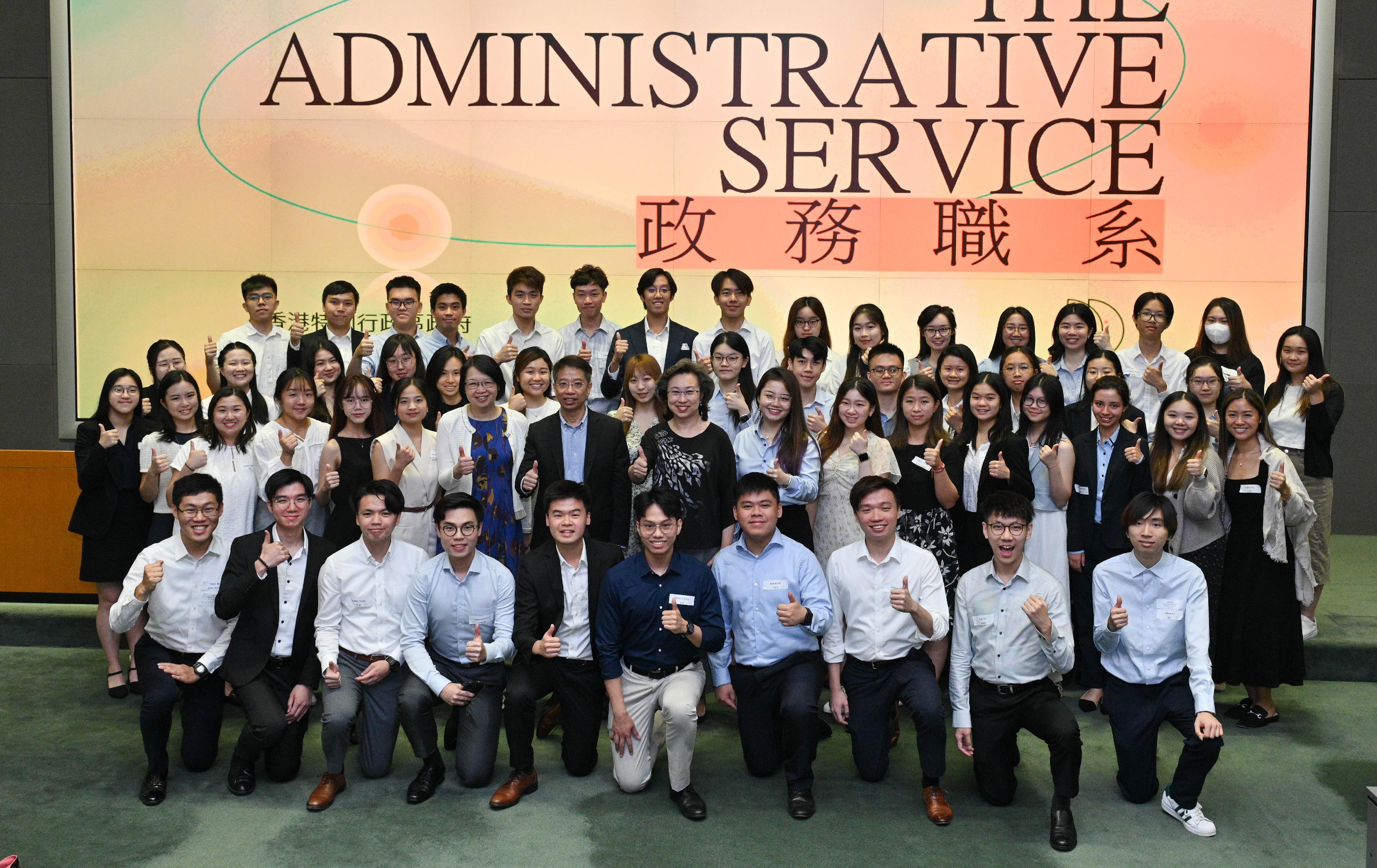 The Secretary for the Civil Service, Mrs Ingrid Yeung (second row, ninth right), and the Permanent Secretary for the Civil Service, Mr Clement Leung, (second row, tenth right), today (August 1) meet and interact with more than 50 university students participating in the Administrative Service Summer Internship Programme to encourage them to apply for civil service positions such as the Administrative Officer post.
