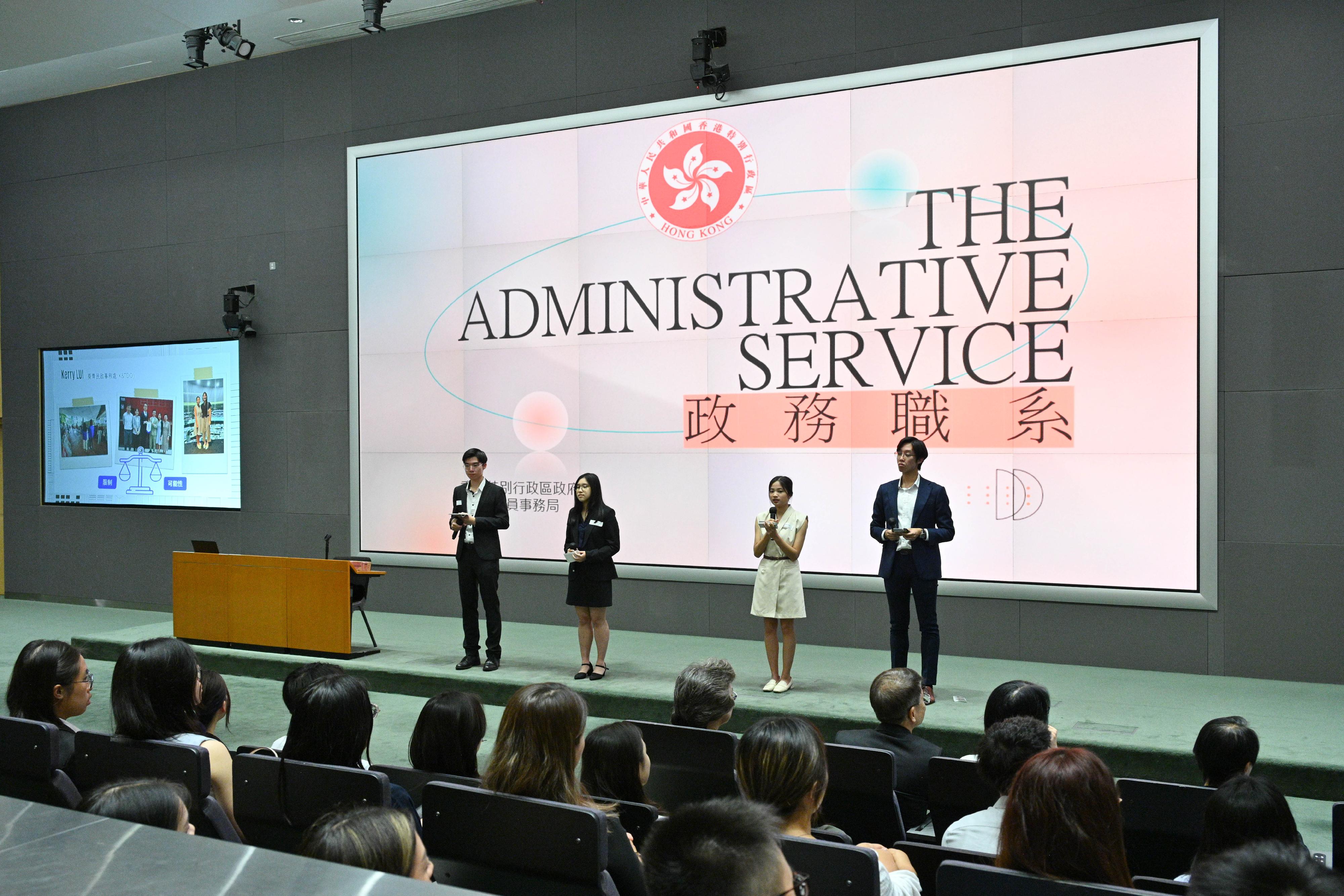 The Secretary for the Civil Service, Mrs Ingrid Yeung, met and interacted with more than 50 university students participating in the Administrative Service Summer Internship Programme today (August 1), encouraging them to apply for civil service positions such as the Administrative Officer post. Photo shows four interns speaking on their internship experiences at the District Offices.