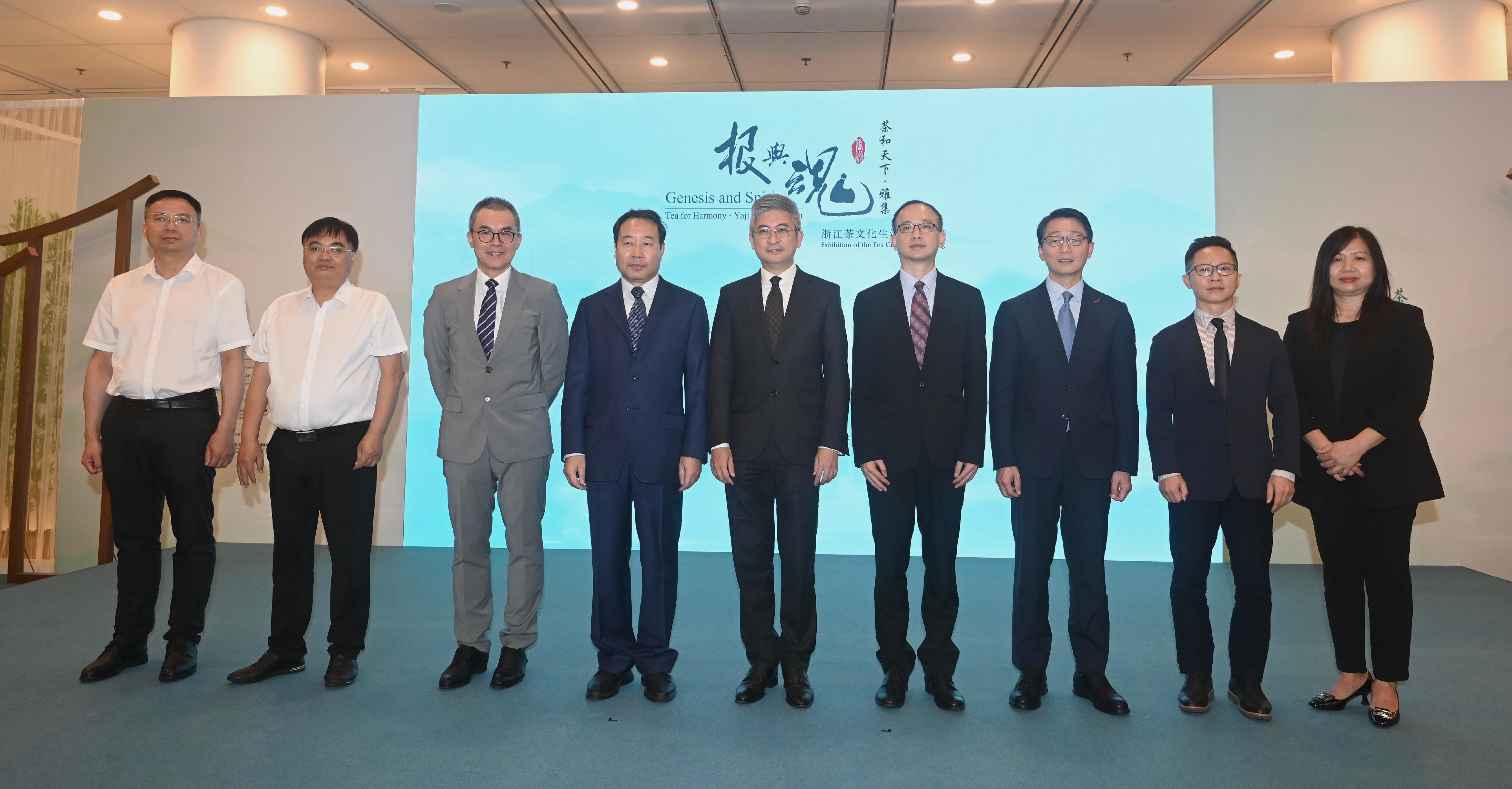 The opening ceremony for the "Genesis and Spirit - Tea for Harmony · Yaji Cultural Salon: Exhibition of the Tea Culture of Zhejiang" was held today (August 4) at the Hong Kong Central Library. Photo shows (from left) the Secretary, Deputy Director of the Zhejiang Provincial Center of Intangible Cultural Heritage Protection, Mr Wu Yanfei; Second-Grade Inspector of the Zhejiang Provincial Department of Culture and Tourism Mr Dai Yan; the Chairperson of the Intangible Cultural Heritage Advisory Committee, Professor Ricardo Mak; the Director of the Asia Tourism Exchange Center of the Ministry of Culture and Tourism, Mr Zhang Dong; the Under Secretary for Culture, Sports and Tourism, Mr Raistlin Lau; the Deputy Director-General of the Department of Publicity, Cultural and Sports Affairs of the Liaison Office of the Central People's Government in the Hong Kong Special Administrative Region, Mr Lin Nan; the Director of Leisure and Cultural Services, Mr Vincent Liu; First-Grade Consultant of the Hong Kong and Macao Affairs Division of International Cooperation and Exchange Bureau (Hong Kong, Macao and Taiwan Affairs Office) of the Ministry of Culture and Tourism Mr Wu Jun; and the Head of the Intangible Cultural Heritage Office, Ms Joyce Ho, officiating at the ceremony.