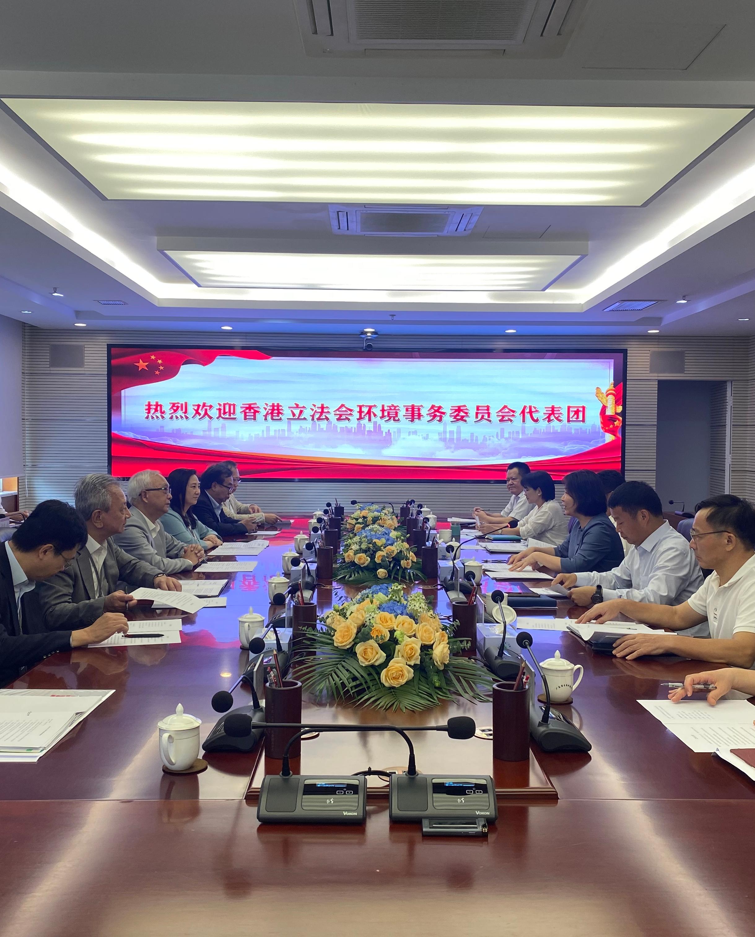 The Secretary for Environment and Ecology, Mr Tse Chin-wan, together with the Legislative Council Panel on Environmental Affairs, today (August 7) visited the Department of Ecology and Environment of Guangdong Province in the morning. Photo shows Mr Tse (third left), and the Chairman of the Legislative Council Panel on Environmental Affairs, Ms Elizabeth Quat (fourth left), and the delegation of the Legislative Council Panel on Environmental Affairs, meeting with the Director-General of the Department of Ecology and Environment of Guangdong Province, Ms Xu Xiaoxia (third right), and Deputy Director-General of the Department of Ecology and Environment of Guangdong Province Mr Jiang Hongqi (second right), on work related to ecological conservation, environmental pollution prevention, combating climate change, etc.