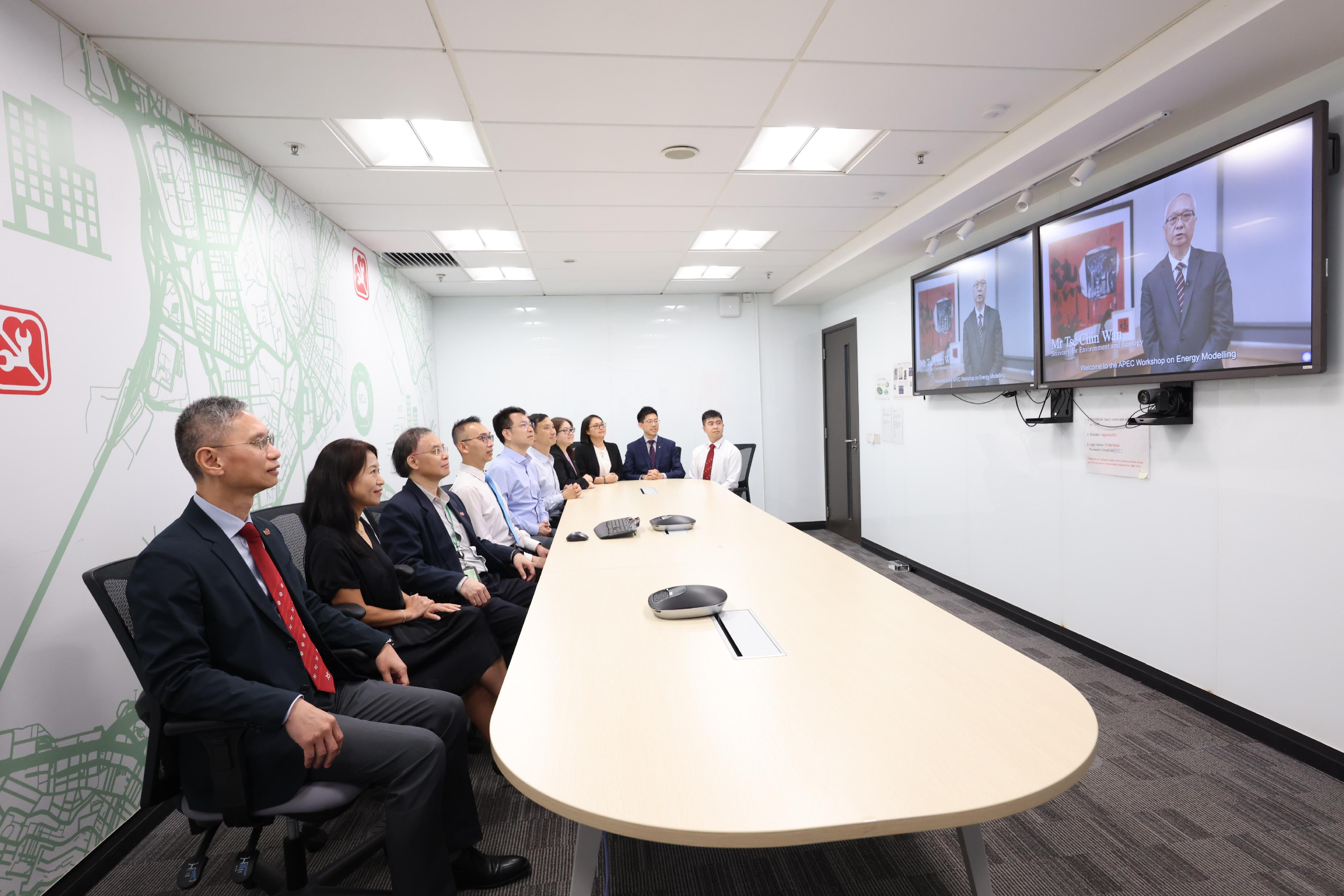 The Asia-Pacific Economic Cooperation Workshop on Energy Modelling was held in Hong Kong, China via video conference today (August 8). Photo shows the Secretary for Environment and Ecology, Mr Tse Chin-wan (on the screen), delivering opening remarks.