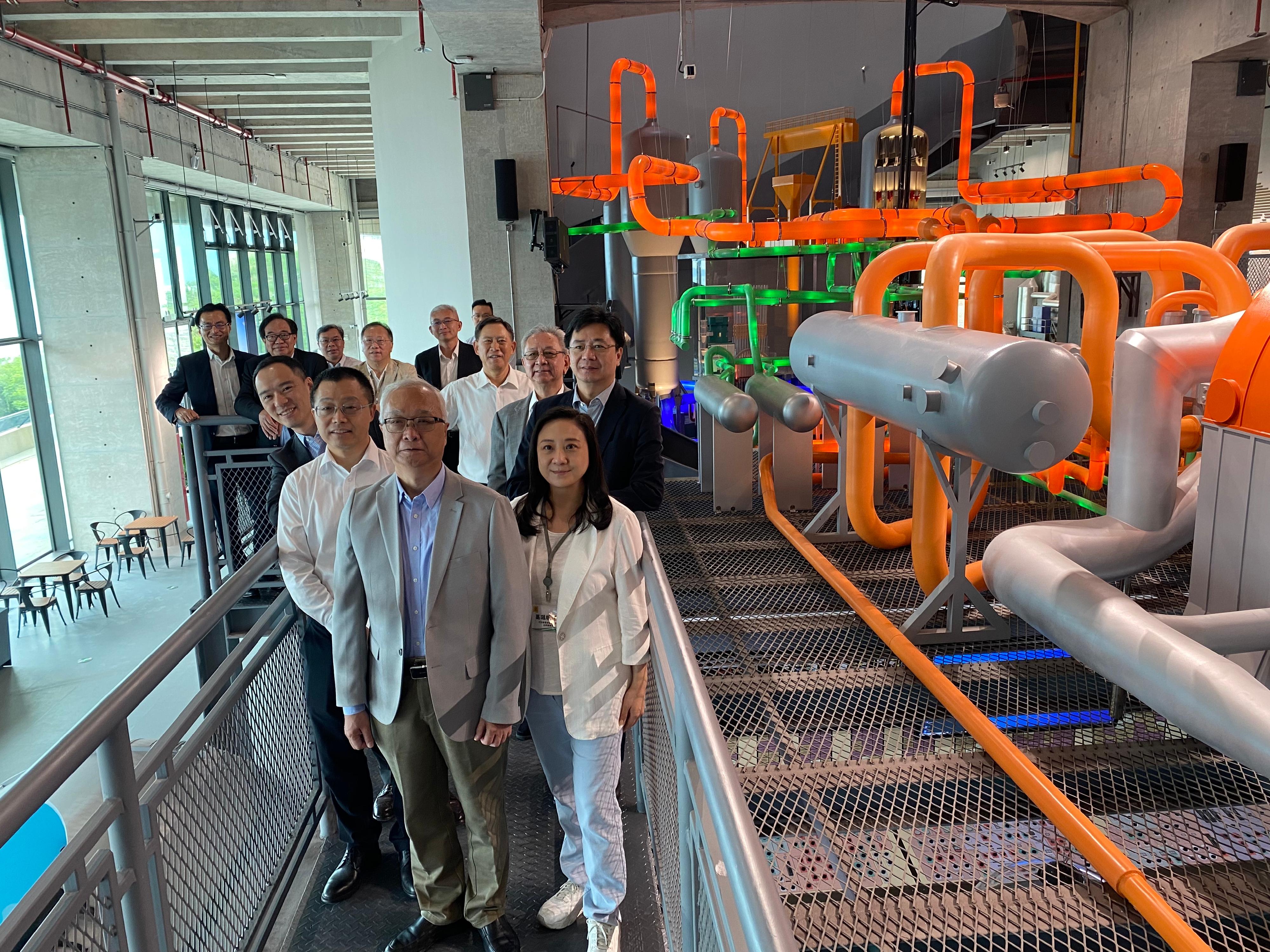 The Secretary for Environment and Ecology, Mr Tse Chin-wan, together with the Legislative Council Panel on Environmental Affairs, today (August 9) visited the Daya Bay Nuclear Power Station in the morning and listened to a briefing on the production of nuclear power and the development of nuclear energy technology in the Mainland. Photo shows Mr Tse (first row, first left) with the delegation of the Legislative Council Panel on Environmental Affairs, the President of the China General Nuclear Power Corporation Limited, Mr Gao Ligang (second row, first left), and the Managing Director of CLP Power, Mr Joseph Law (third row, first left) at the Daya Bay Nuclear Power Science and Technology Museum.