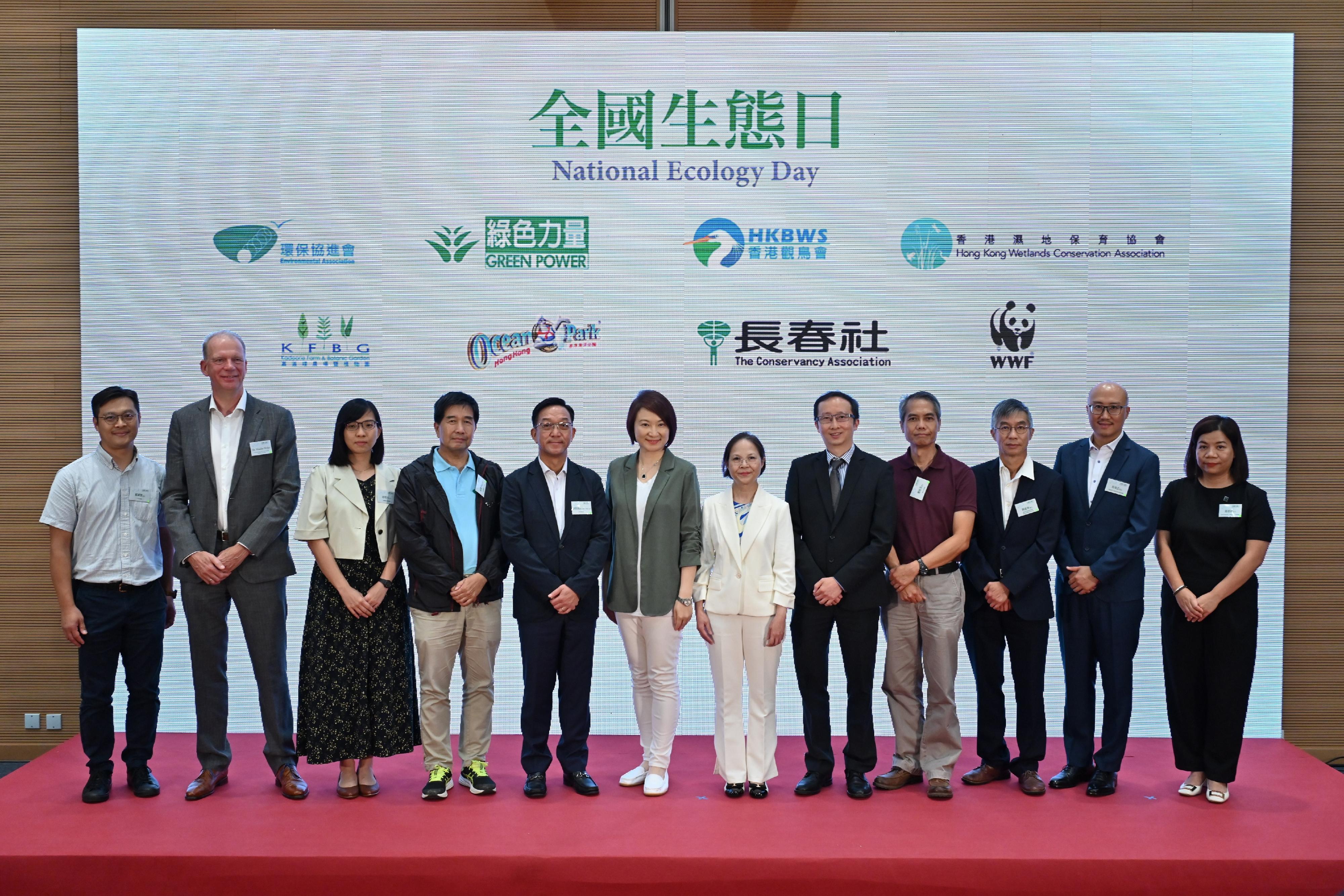 The Government of the Hong Kong Special Administrative Region held the National Ecology Day Launching Ceremony today (August 15) in support of the country's designation of August 15 as National Ecology Day starting this year, with a view to promoting to society the importance of pursuing ecological civilisation and being conscious of the need for action to protect the environment. Photo shows the Acting Secretary for Environment and Ecology, Miss Diane Wong (sixth right); member of the Standing Committee of the 14th National People's Congress and Member of the Legislative Council Ms Starry Lee (sixth left); the Chairman of Heung Yee Kuk New Territories, Mr Kenneth Lau (fifth left); and the Acting Director of the Hong Kong Observatory, Mr Lee Lap-shun (fifth right), with the representatives of the eight organisations supporting the public engagement activities of National Ecology Day.
